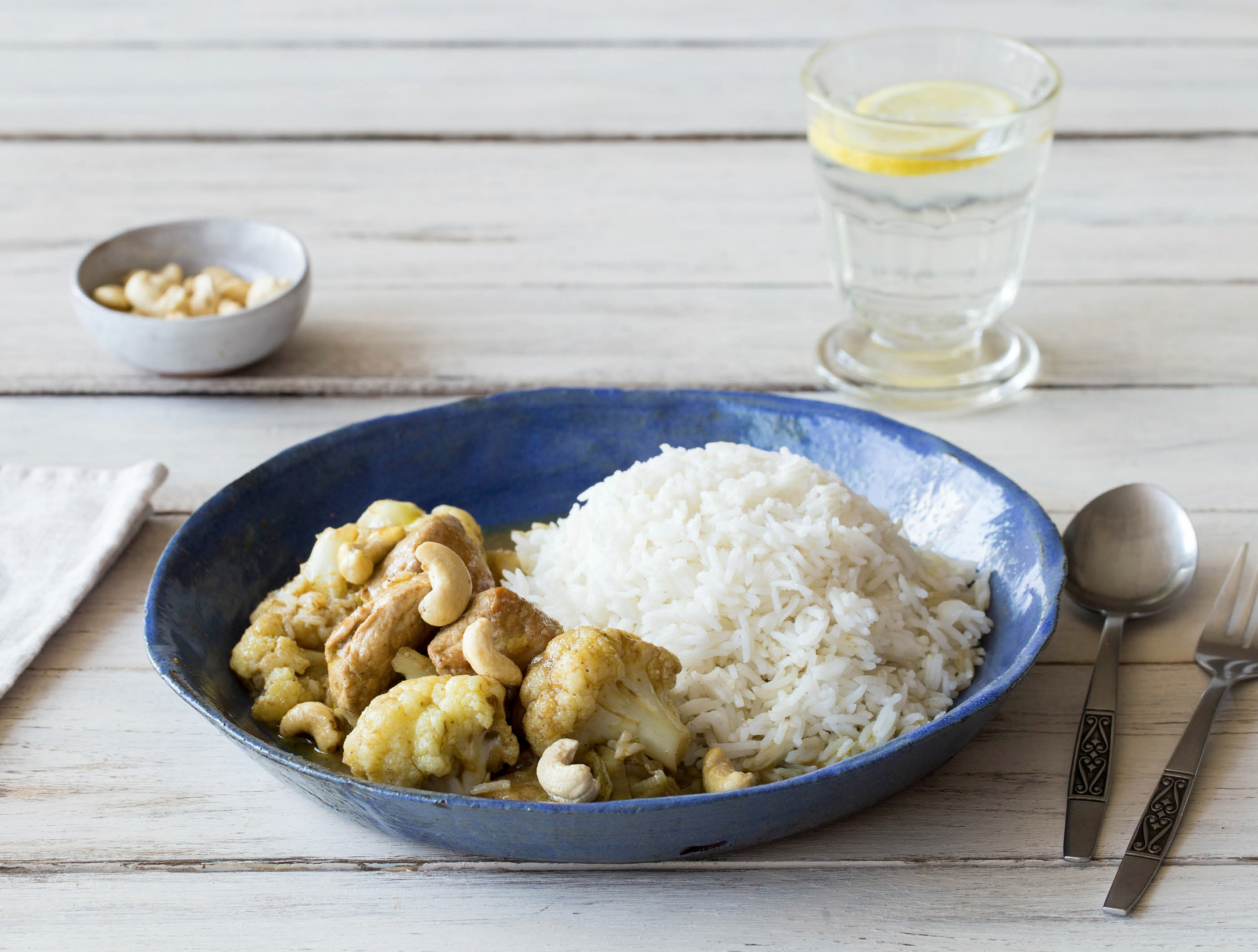 Groene curry met varkenshaasblokjes en cashewnoten