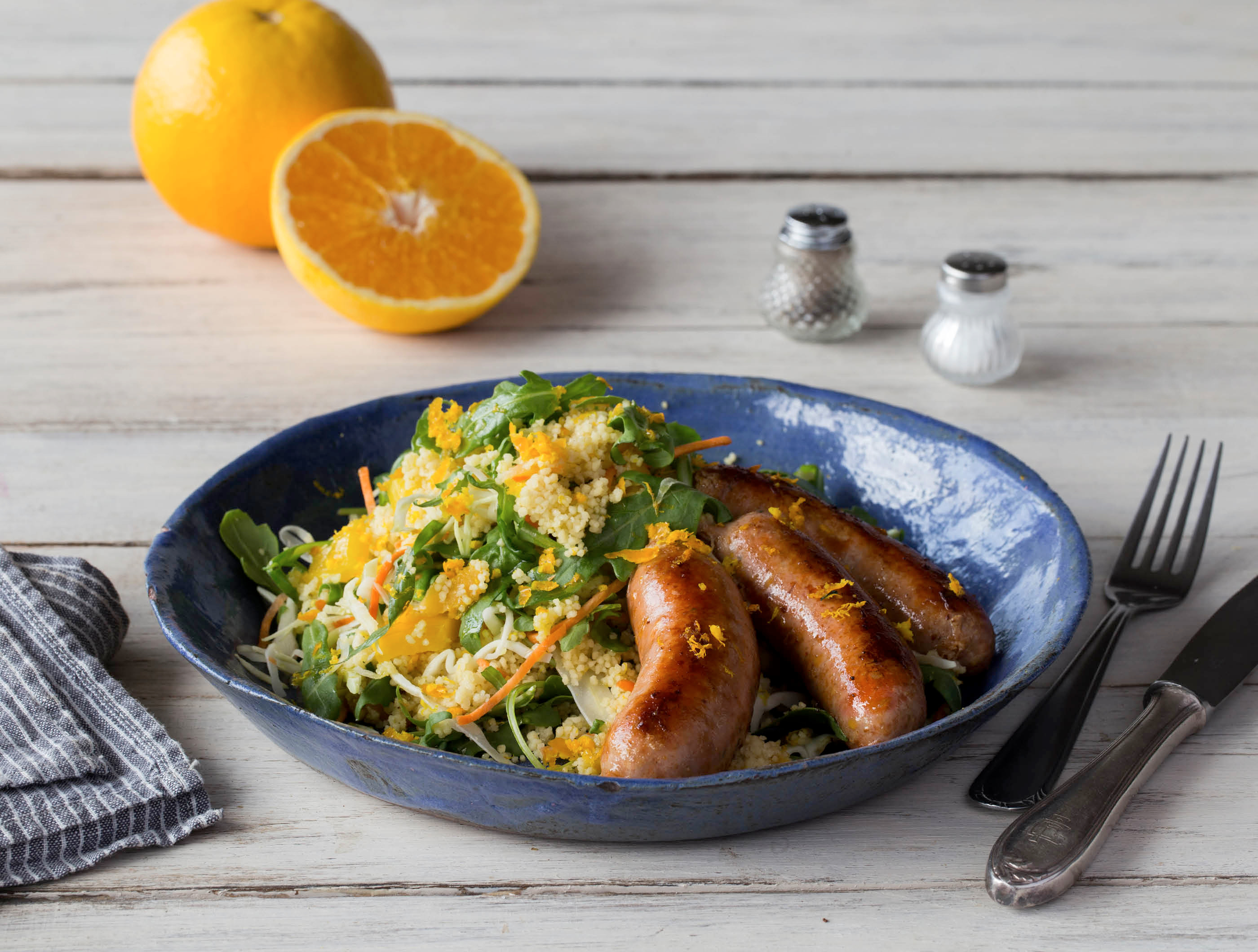 Kruidige kipmerguez met sinaasappel-couscoussalade