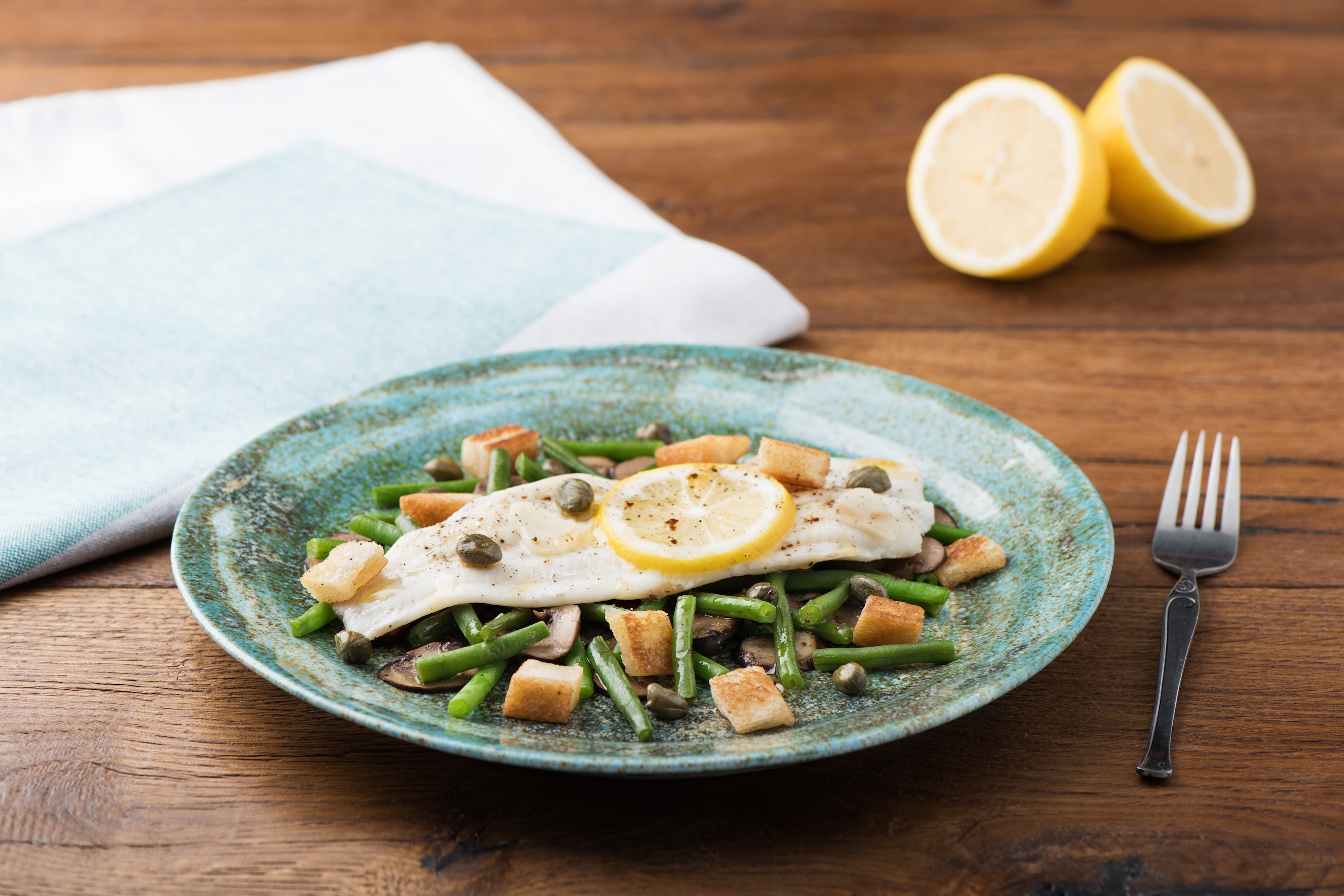 Sole en Papillote with Mushrooms, Croutons, and Brown-Butter Caper Sauce