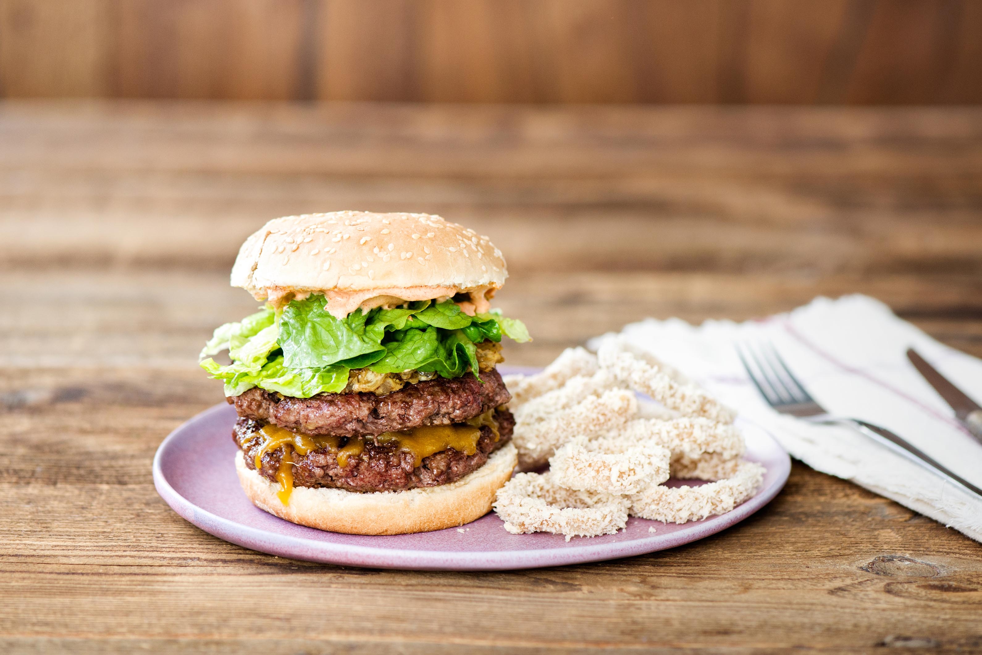 California-Style Griddled Cheeseburgers with Secret Sauce and Crispy Baked Onion Rings