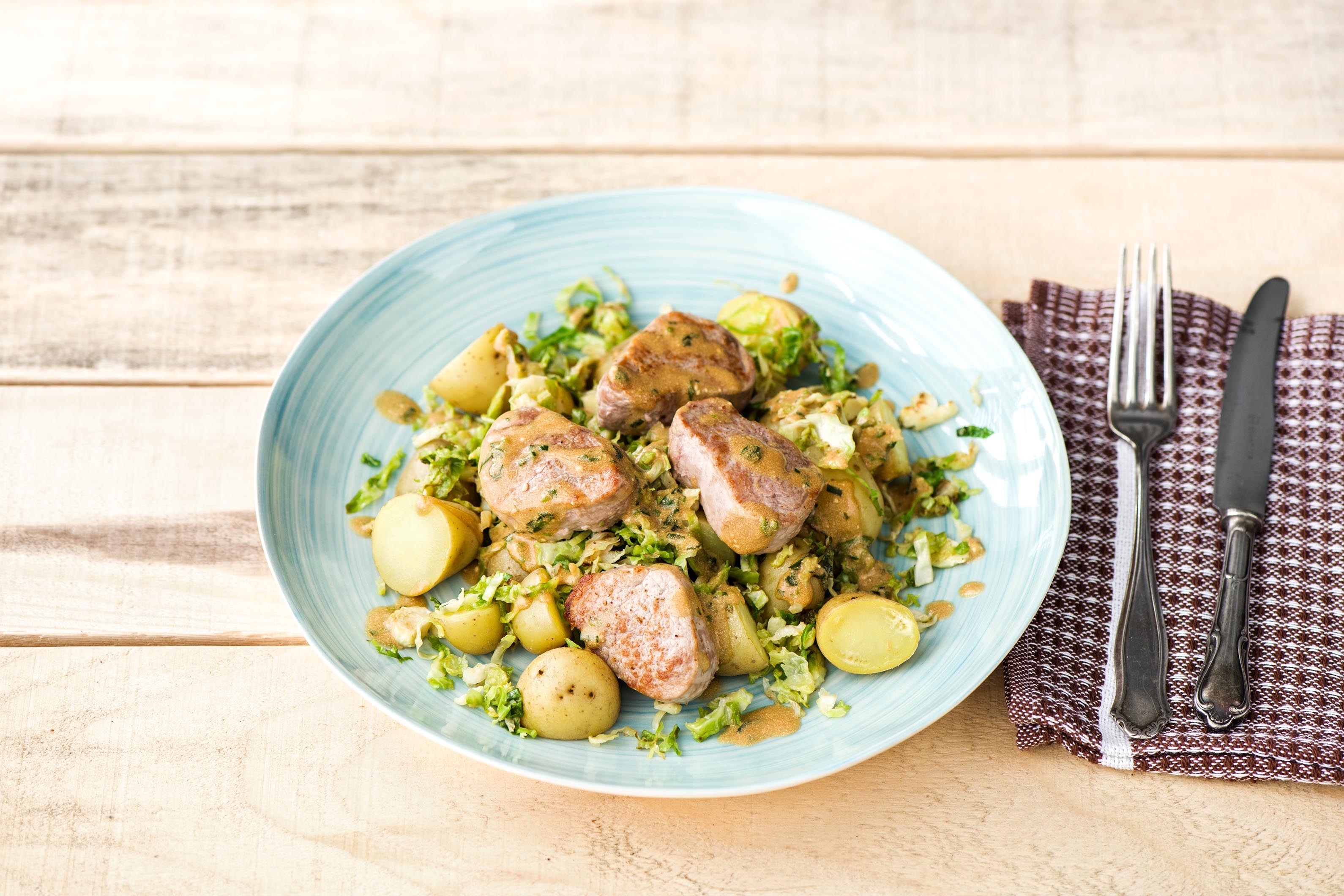 Pork Medallions with Tarragon Cream Sauce, Crispy Brussels Sprouts, and New Potatoes