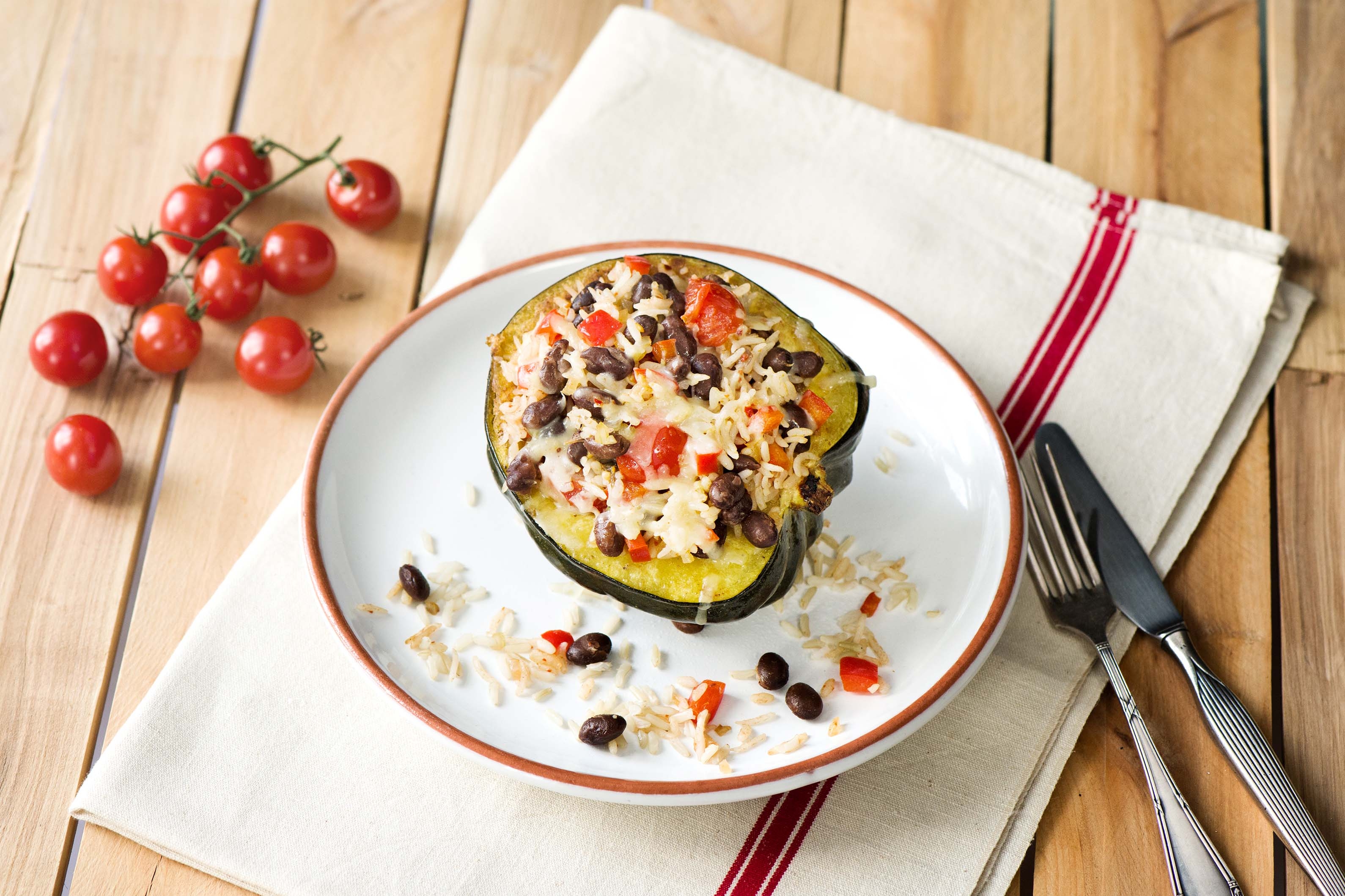 Southwestern-Stuffed Acorn Squash with Smoky Black Beans, Tomatoes, and Mozzarella