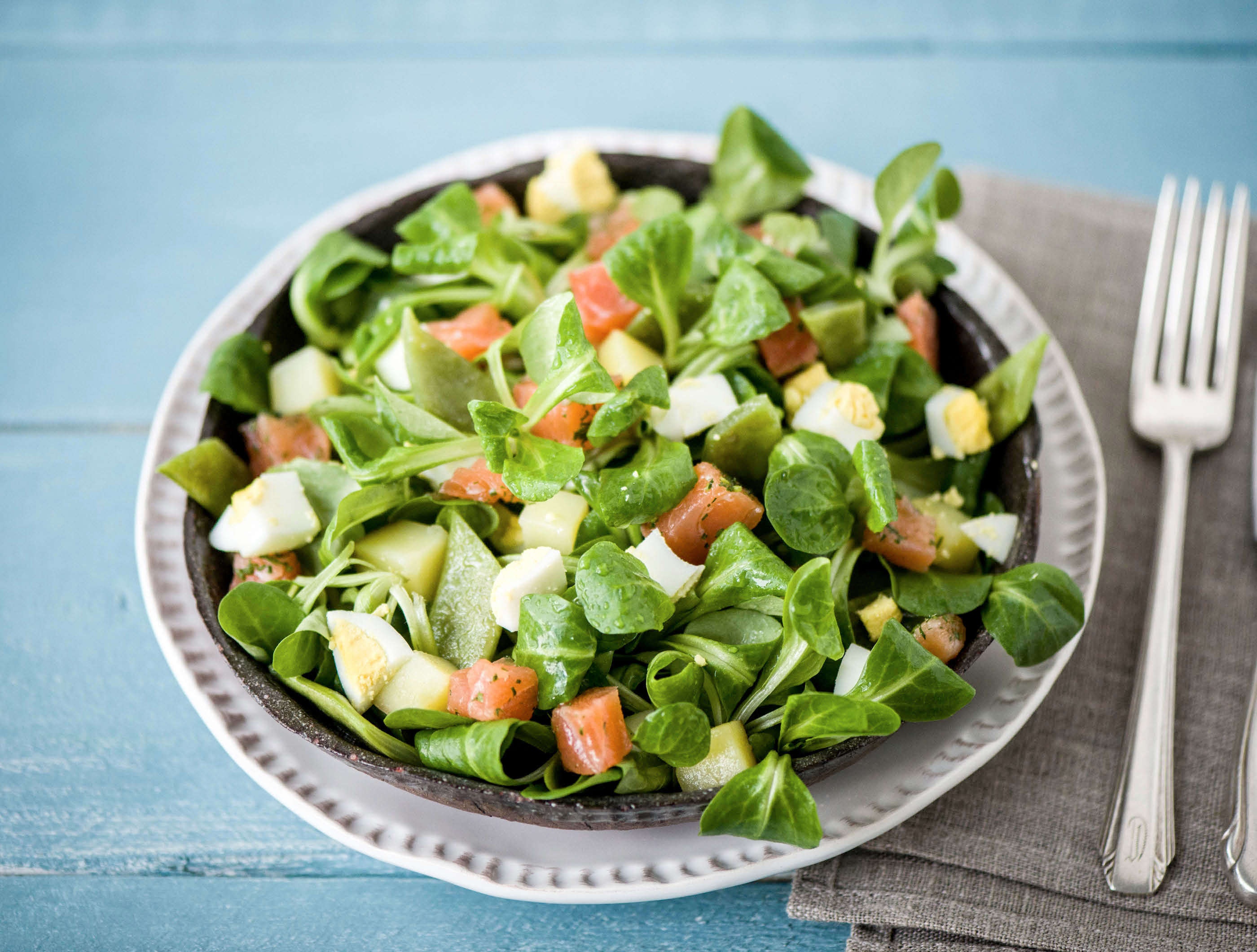 Warme salade van gravlax, aardappelen en snijbonen