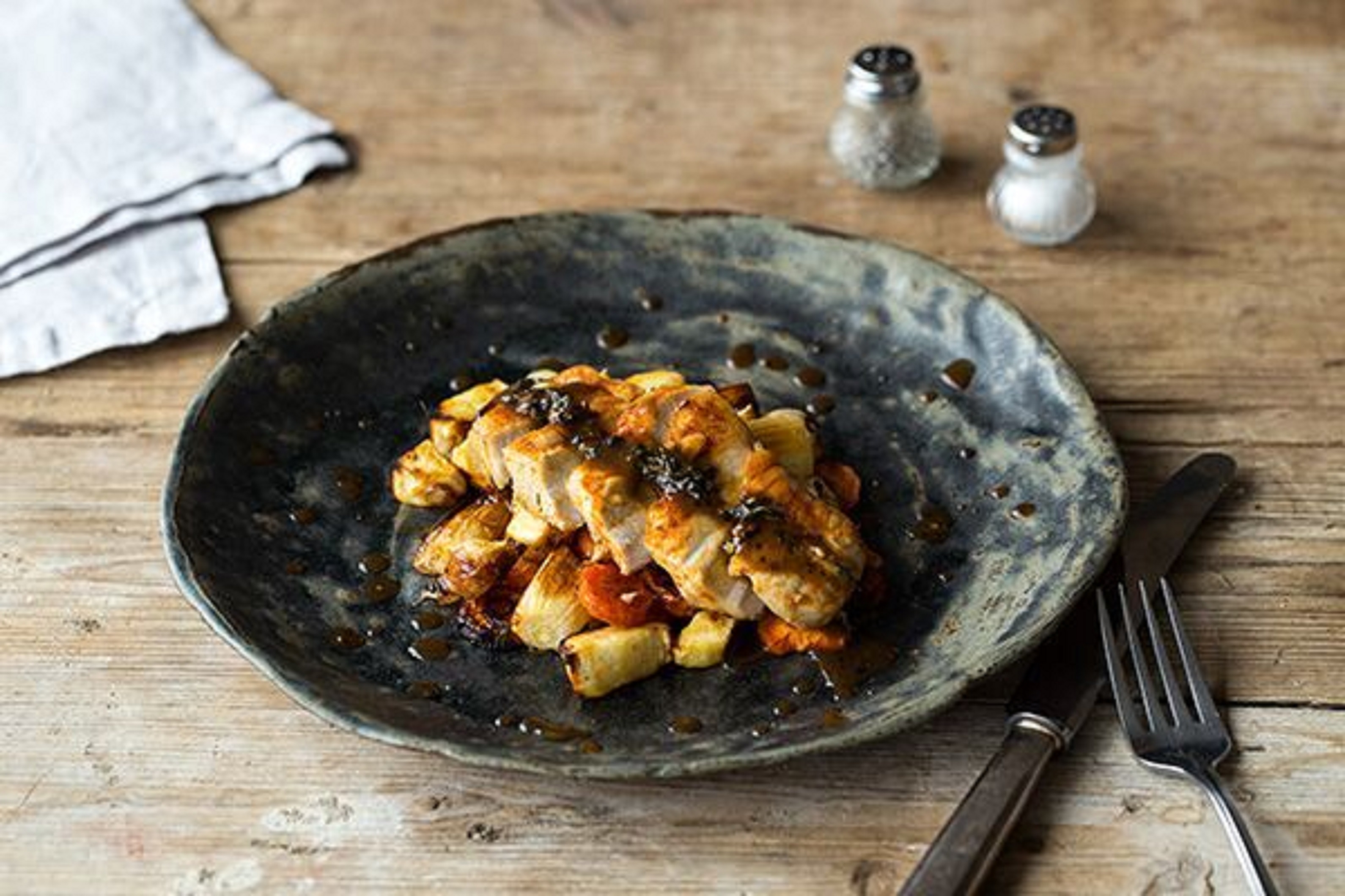 Sugar-Rubbed Pork Chops with Caramelized Root Vegetables and Thyme Pan-Sauce