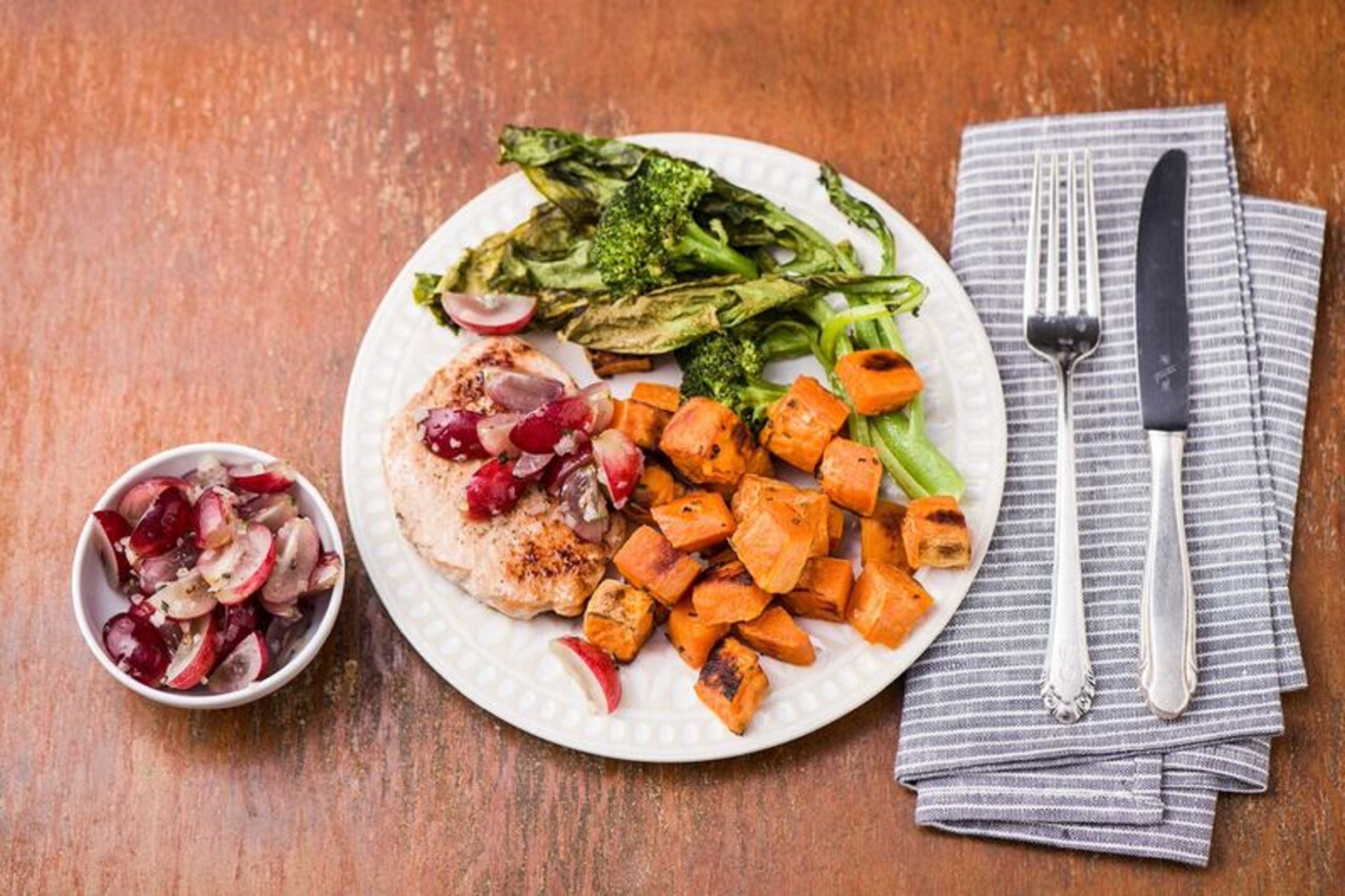 Pan-Seared Pork Chops with Rosemary-Grape Salsa, Sweet Potatoes, and Roasted Broccolini