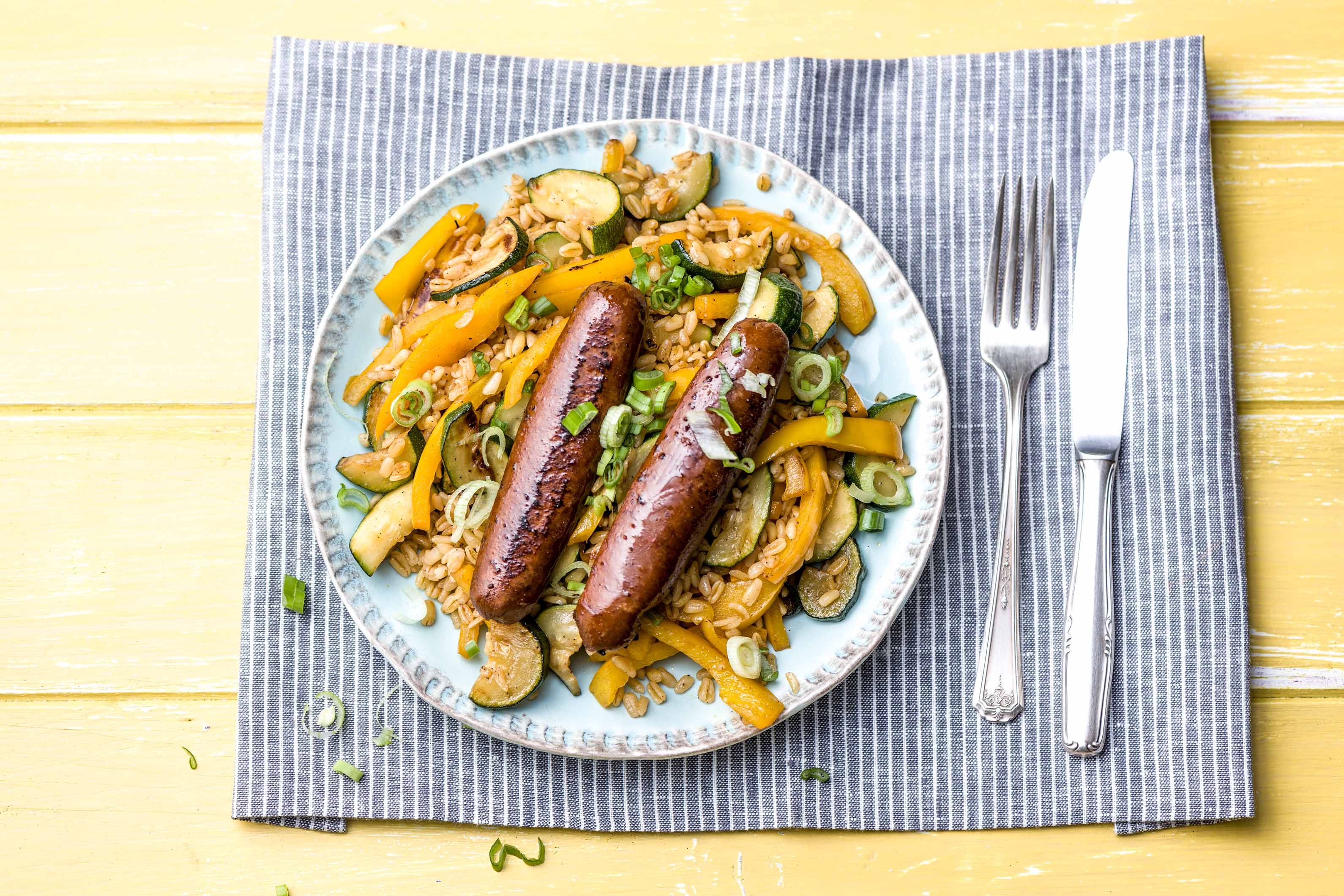 Parelgerst met merguezworstjes