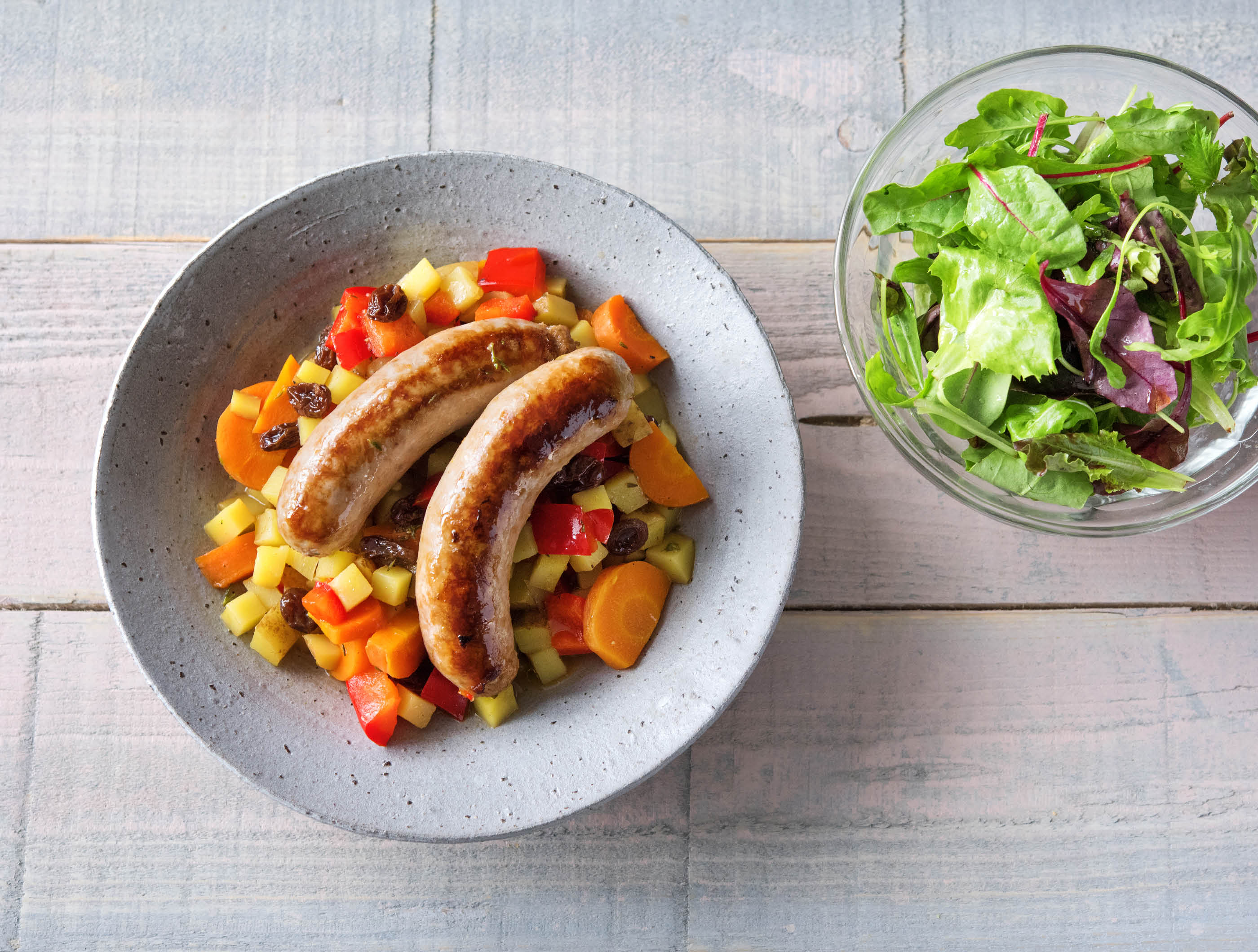 Potée aux légumes, merguez de boeuf et salade