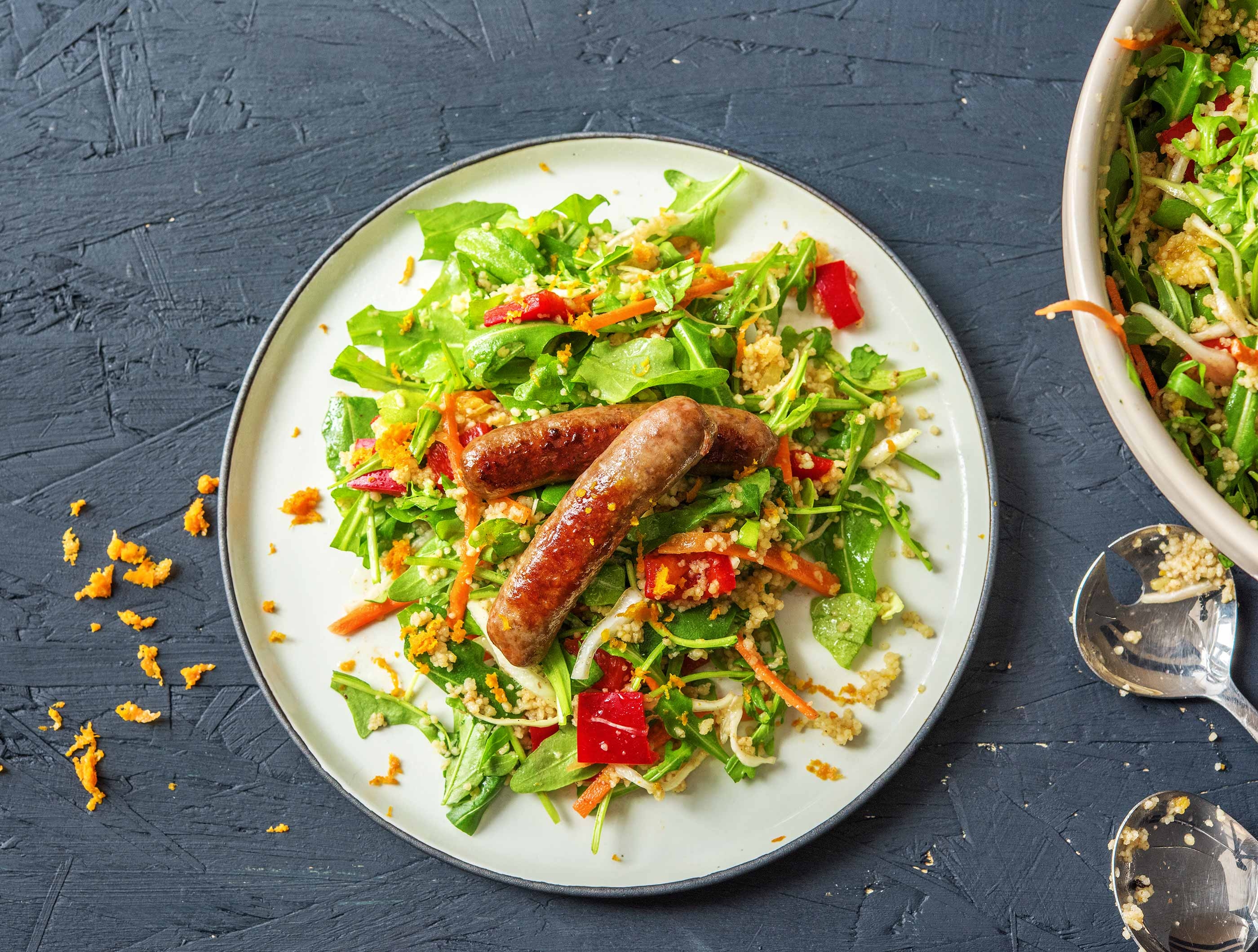 Merguez de poulet épicée et salade de semoule à l’orange