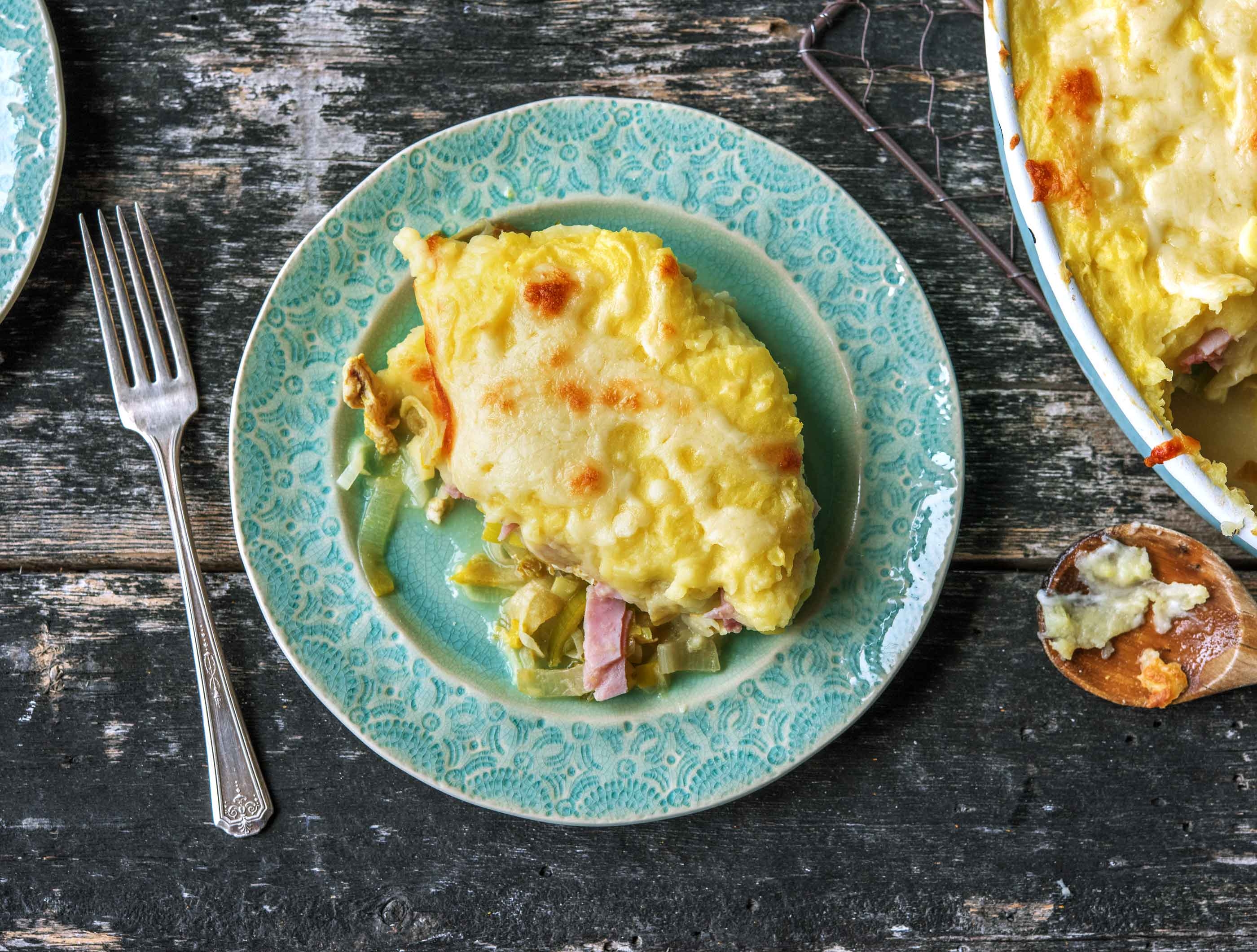 Gratin de poireaux et de chicons accompagné de curry de poulet