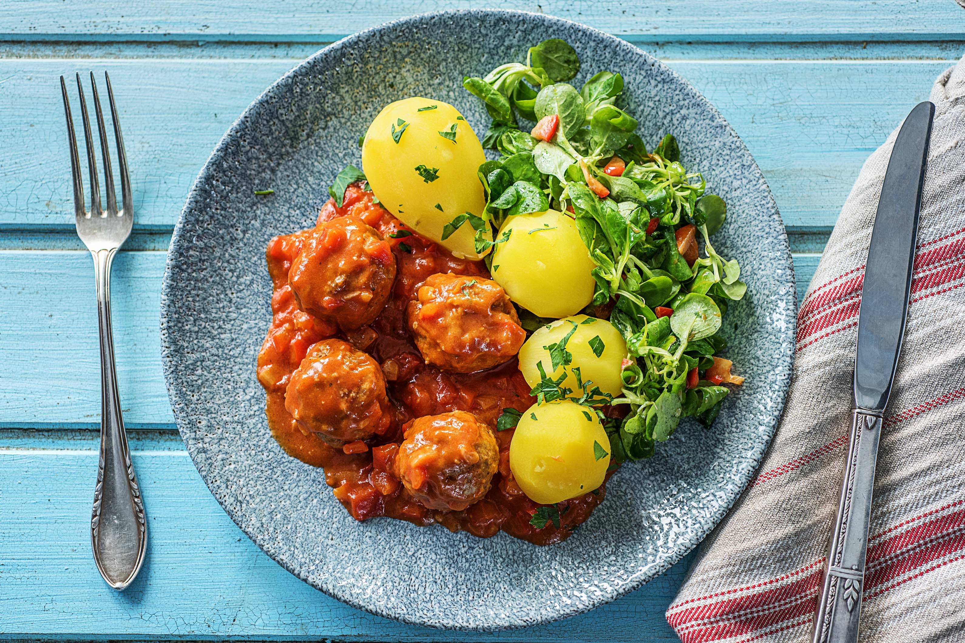 Belgische gehaktballetjes in paprika-tomatensaus