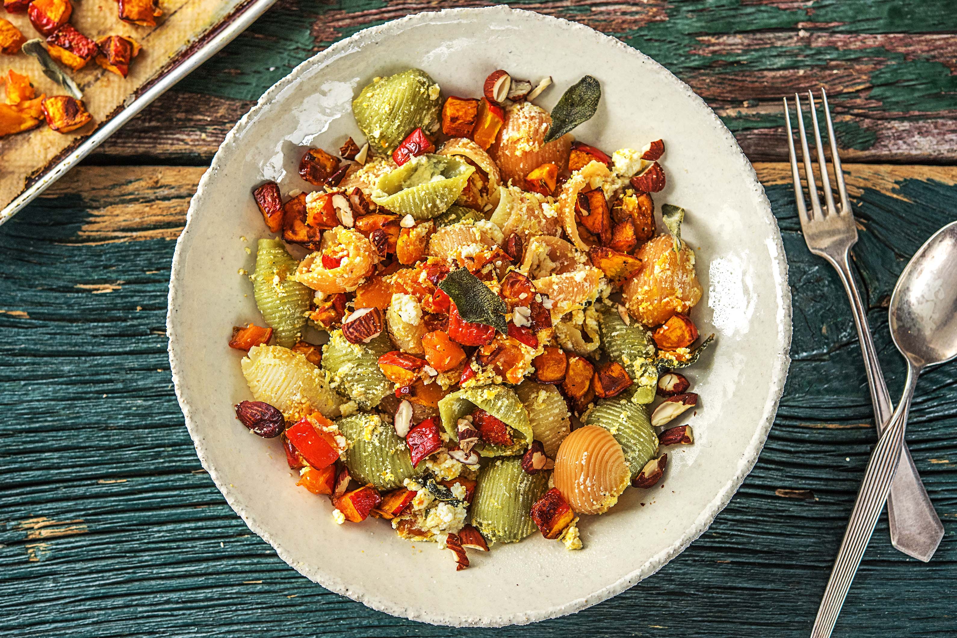 Tricolore-pasta met pompoen en ricotta