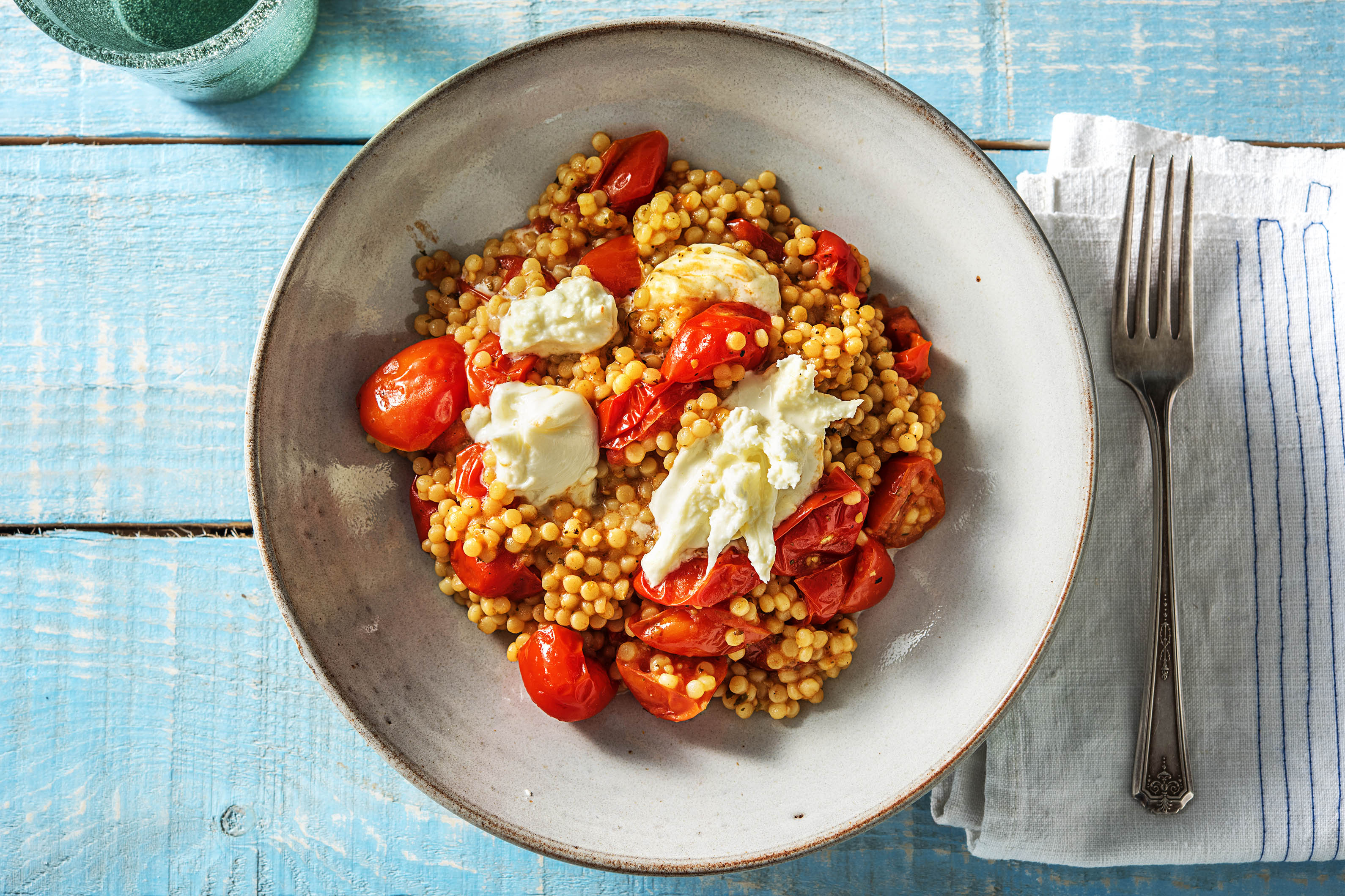 Parelcouscous in tomatensaus