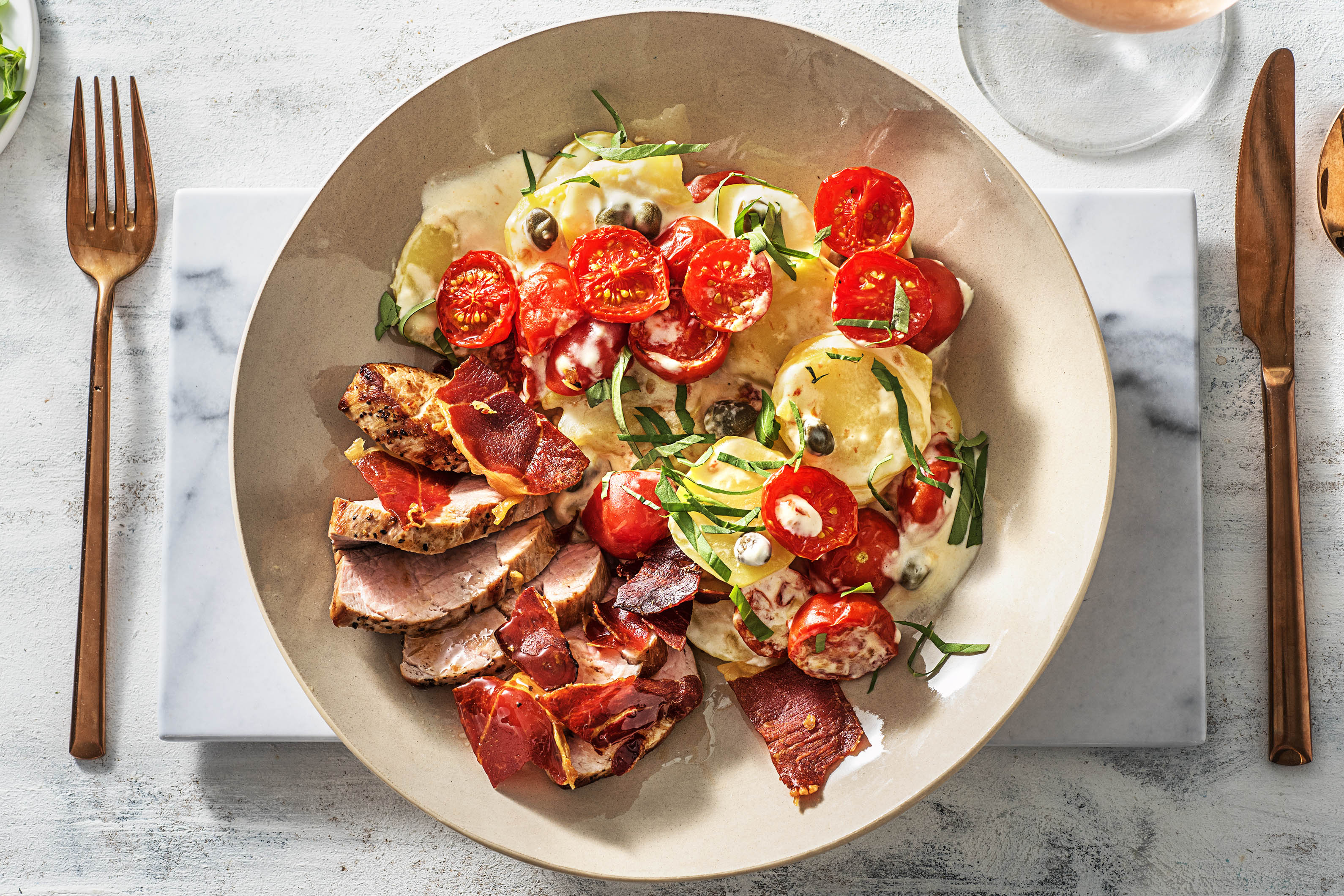 Varkenshaas met zomergratin