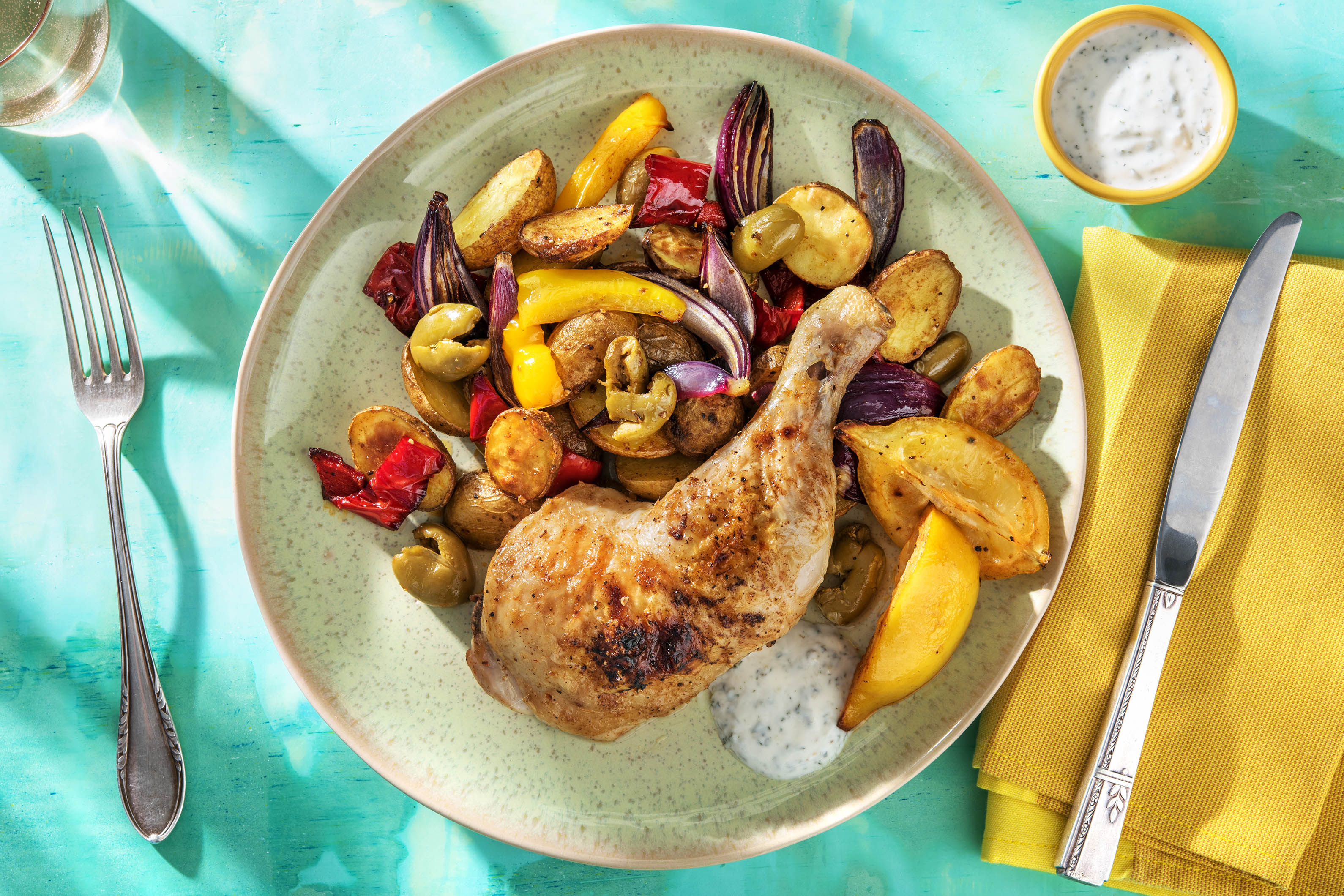 Harissa-Hähnchenkeulen mit grünen Oliven