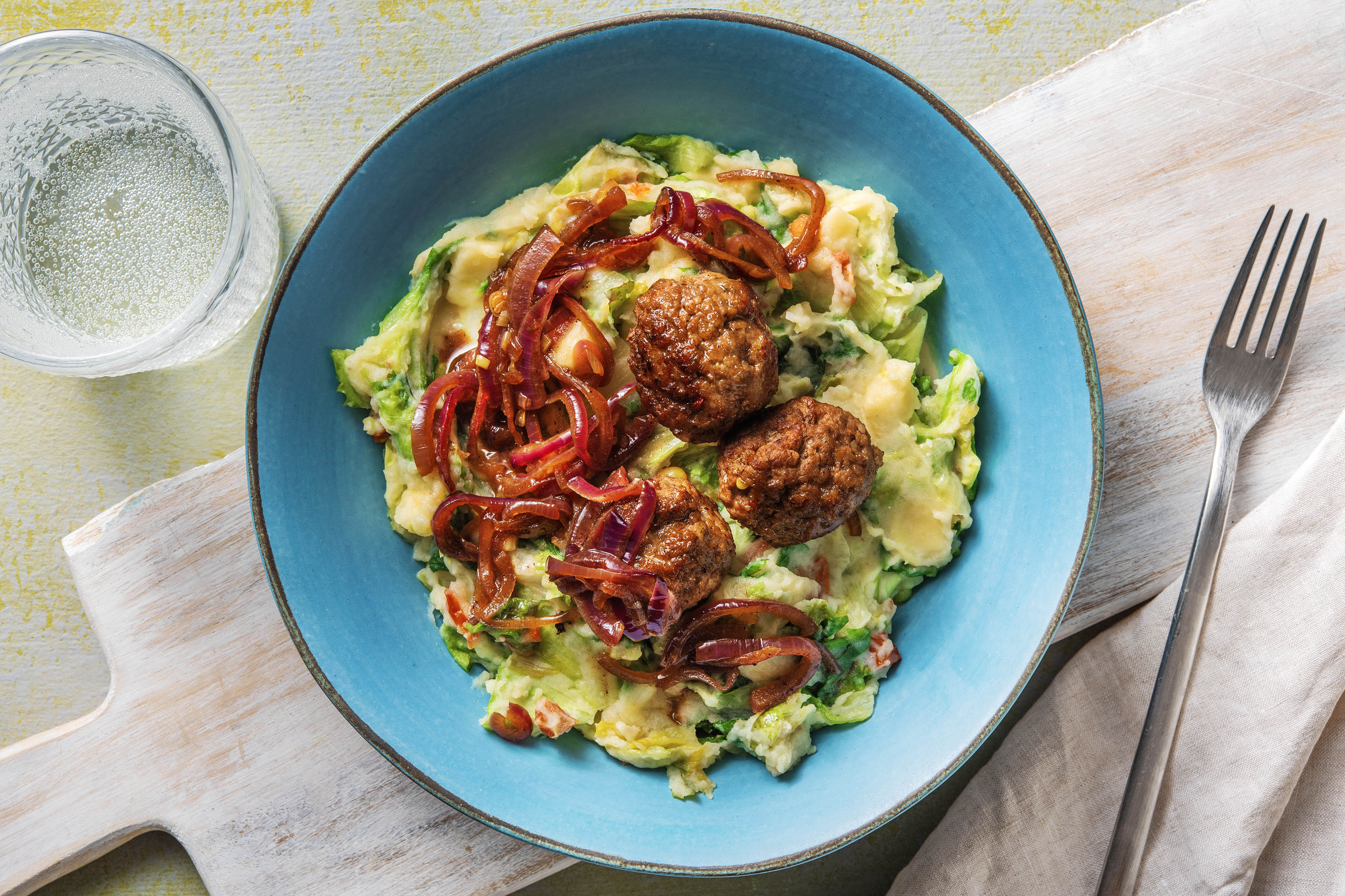 Purée de chicorée et boulettes de viande