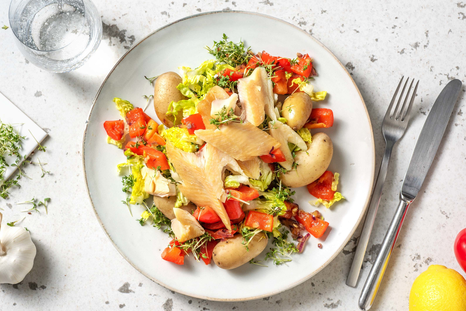 Salade chaude de grenailles et truite fumée