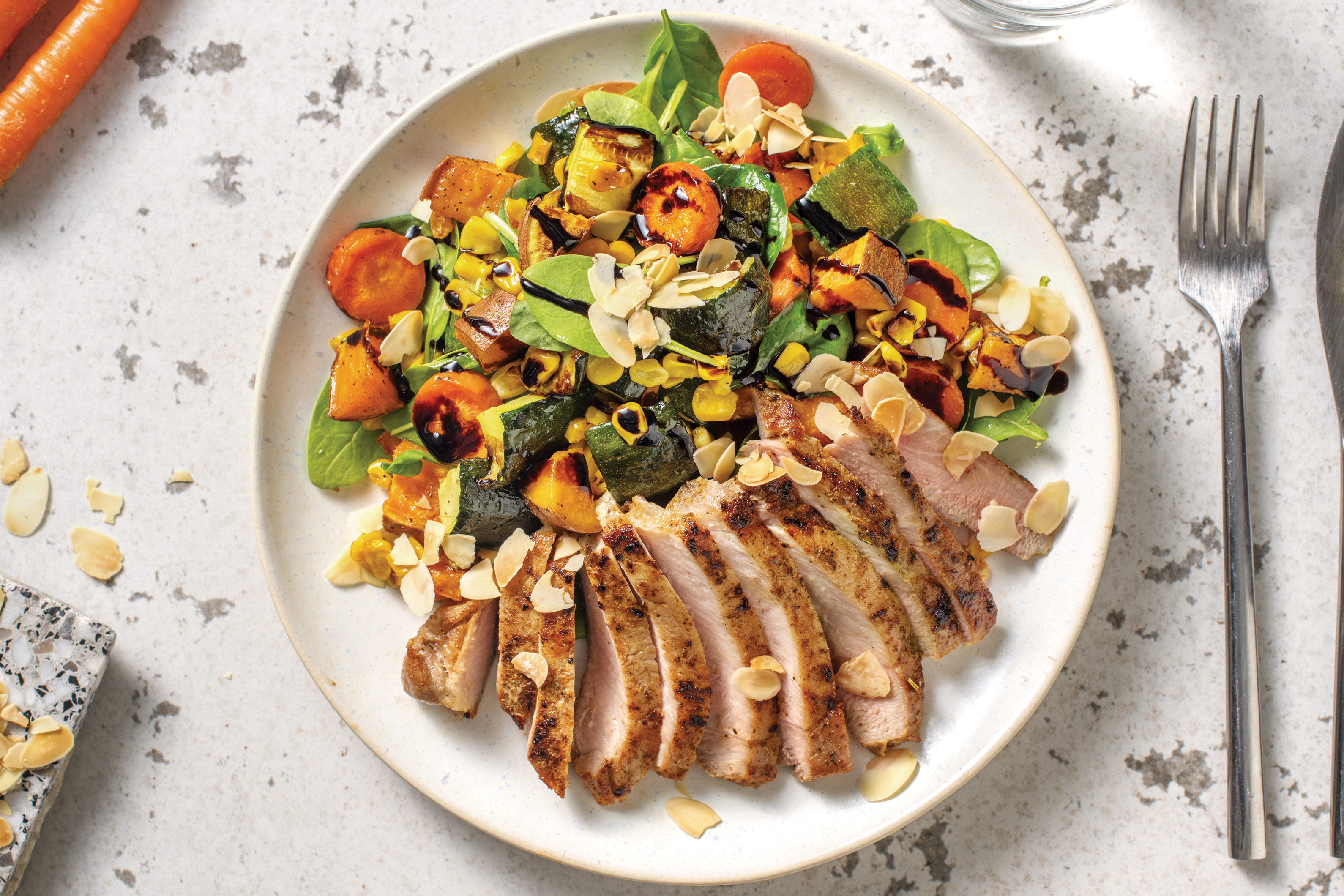 Sweet & Smokey Pork Steaks with Roast Veggie & Baby Spinach Toss