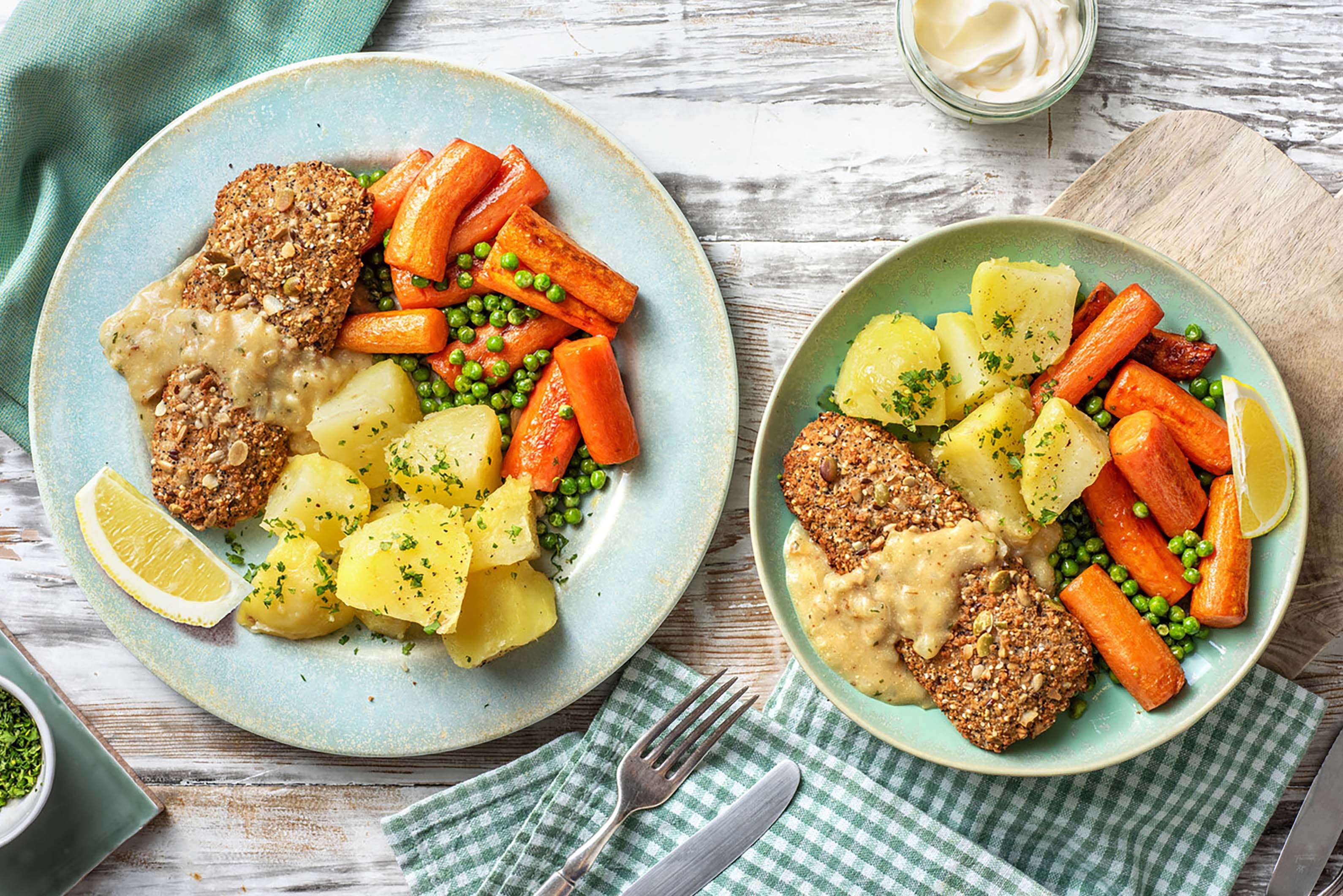 Escalope de poisson panée aux céréales et petits pois-carottes