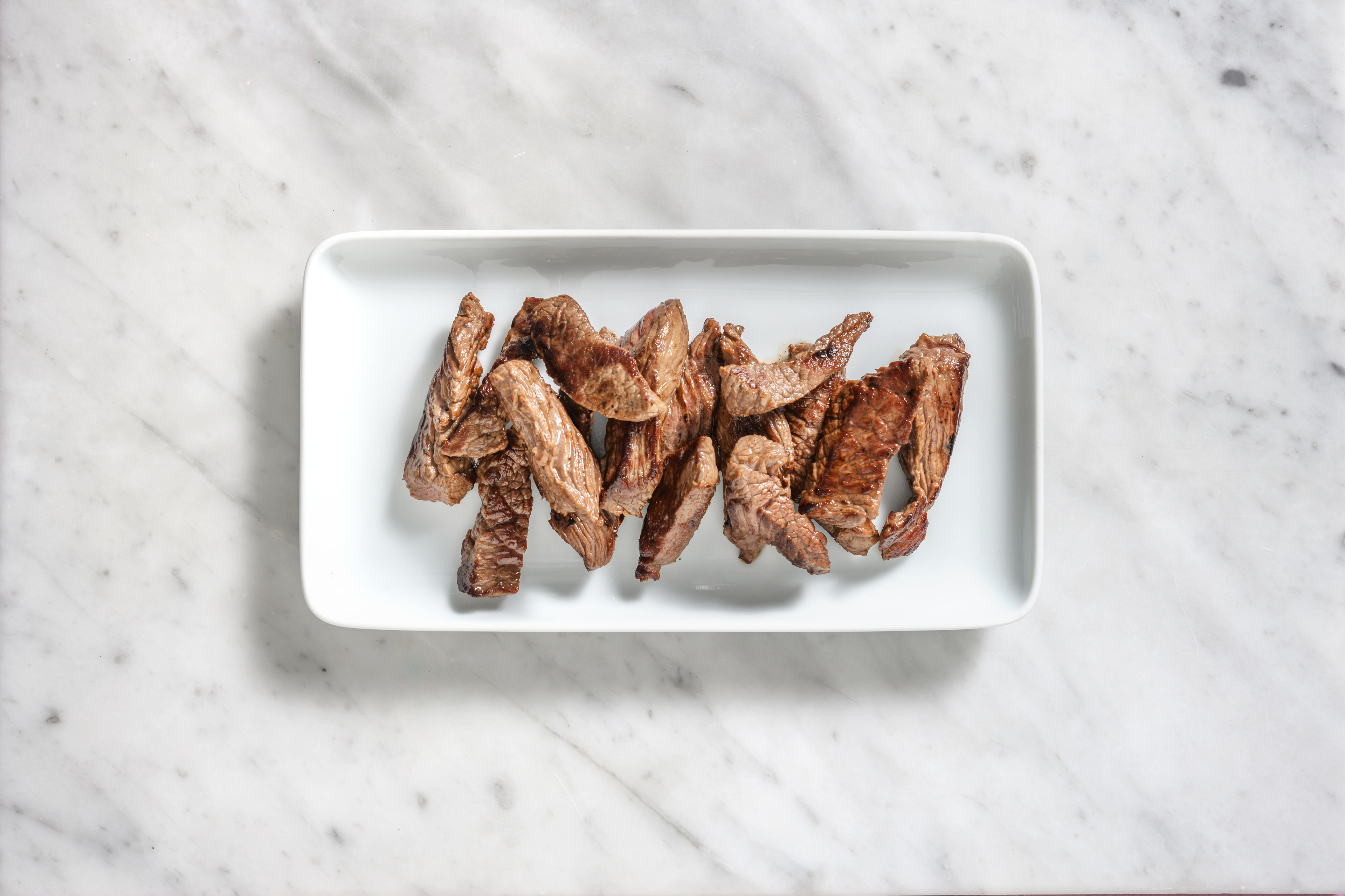 Émincés de steak marinés en extra