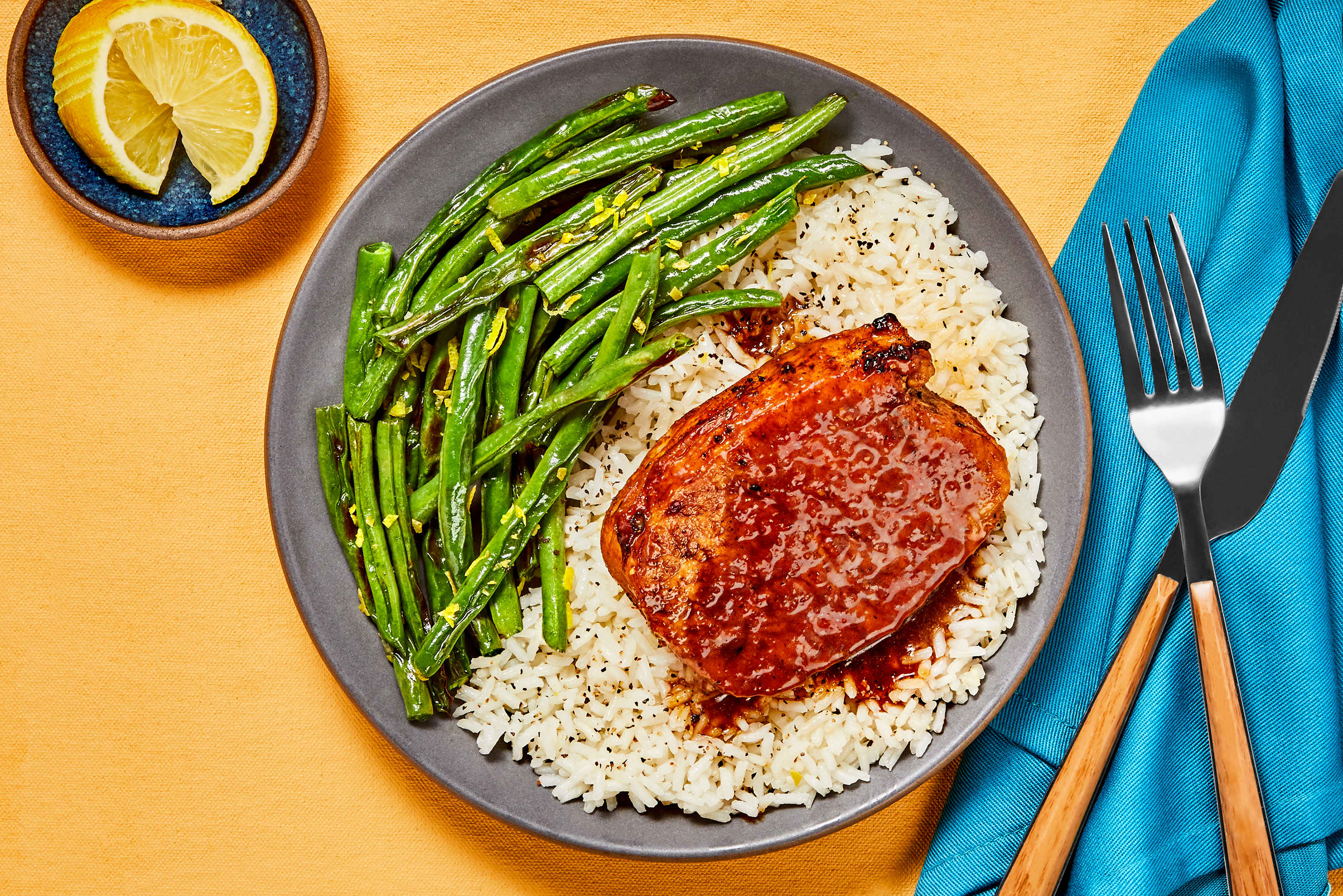 [SWAP PORK CHOPS TO ORGANIC CHICKEN CUTLETS] Peach-Glazed BBQ-Rubbed Pork Chops with Lemony Green Beans and Garlic Rice (10 oz Pork Chop)