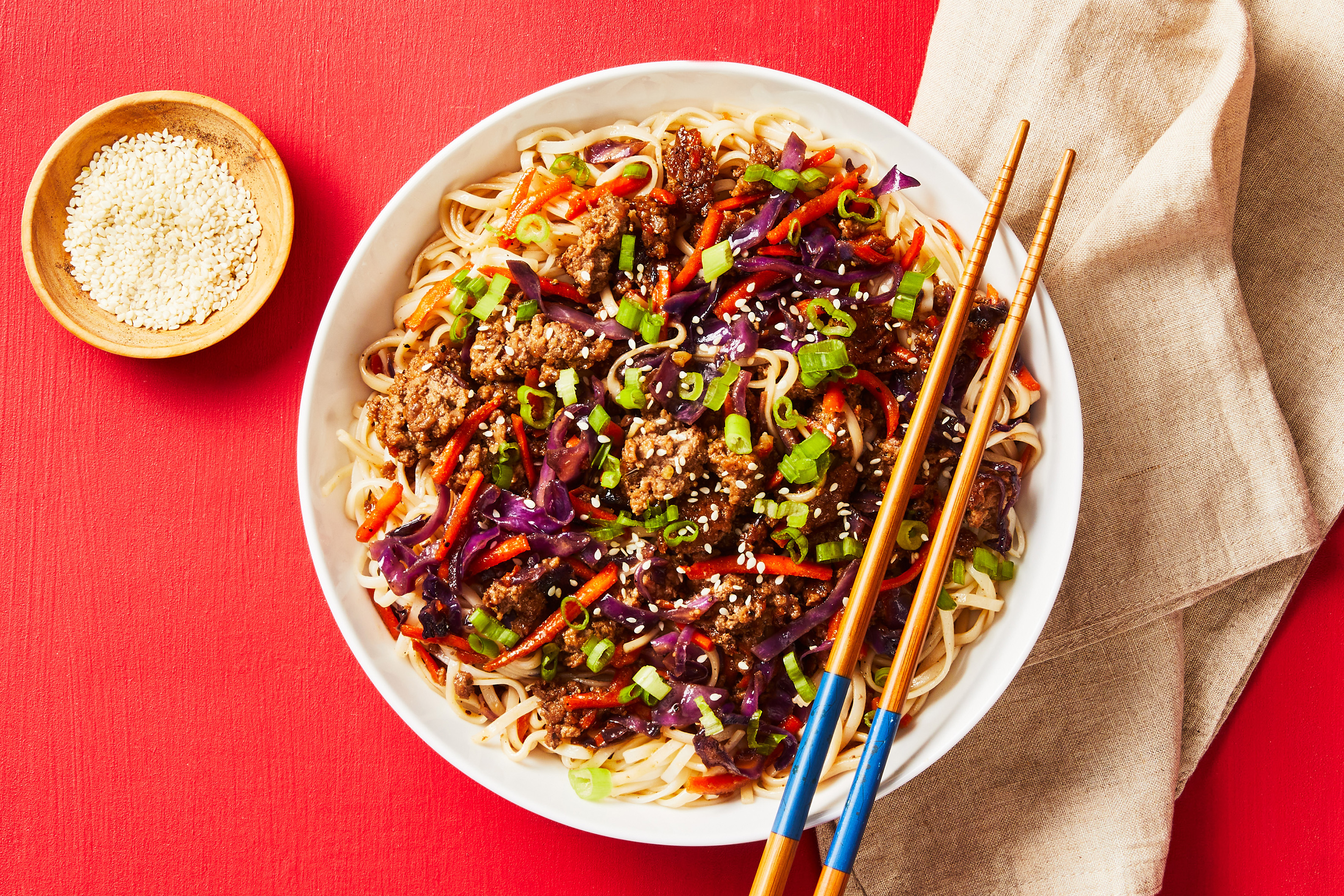 Szechuan Soy Beef Noodles with Scallions, Shredded Carrots and Sesame Seeds (Scallion 1;1)