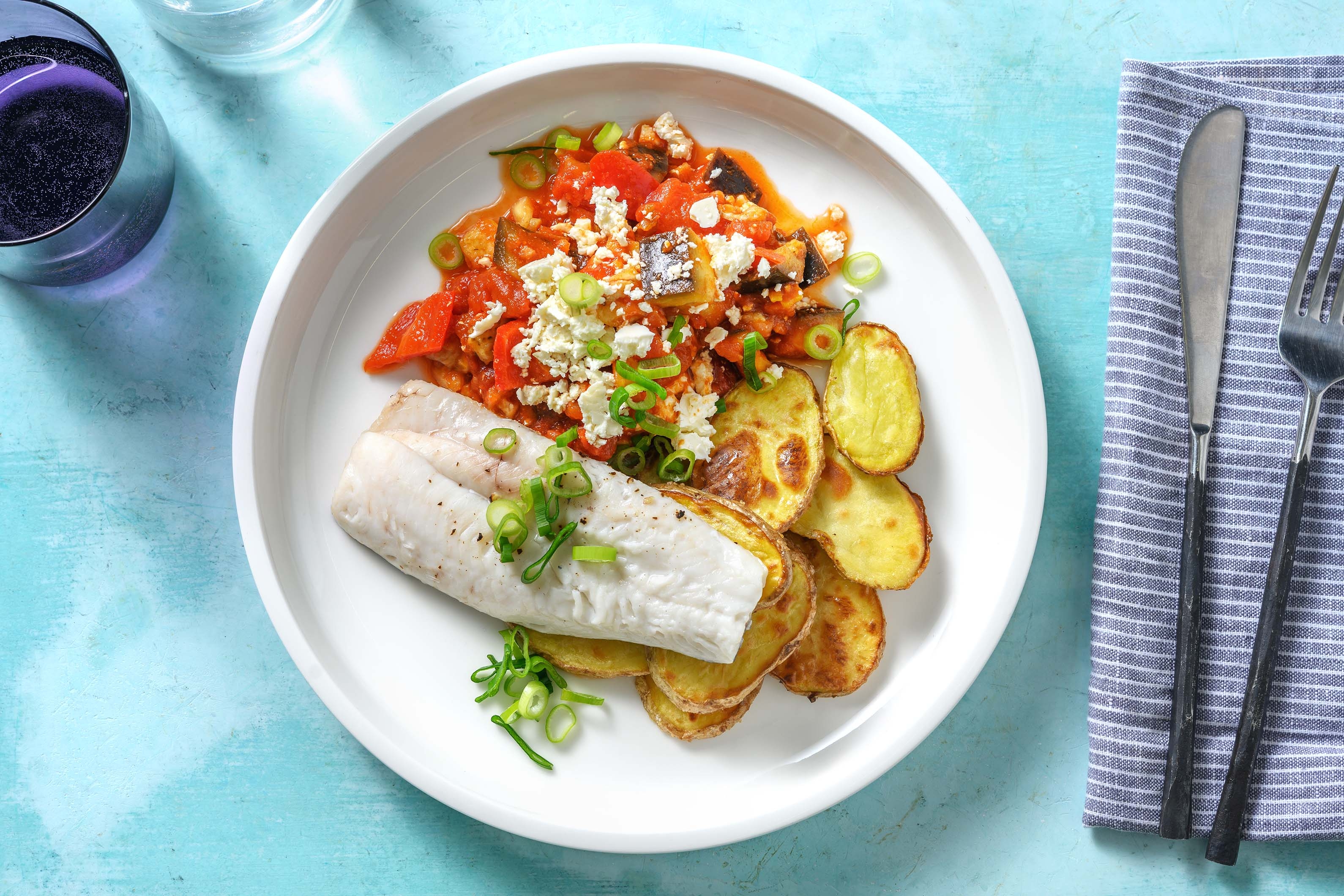 Seehecht mit Tomaten-Zucchini-Gemüse