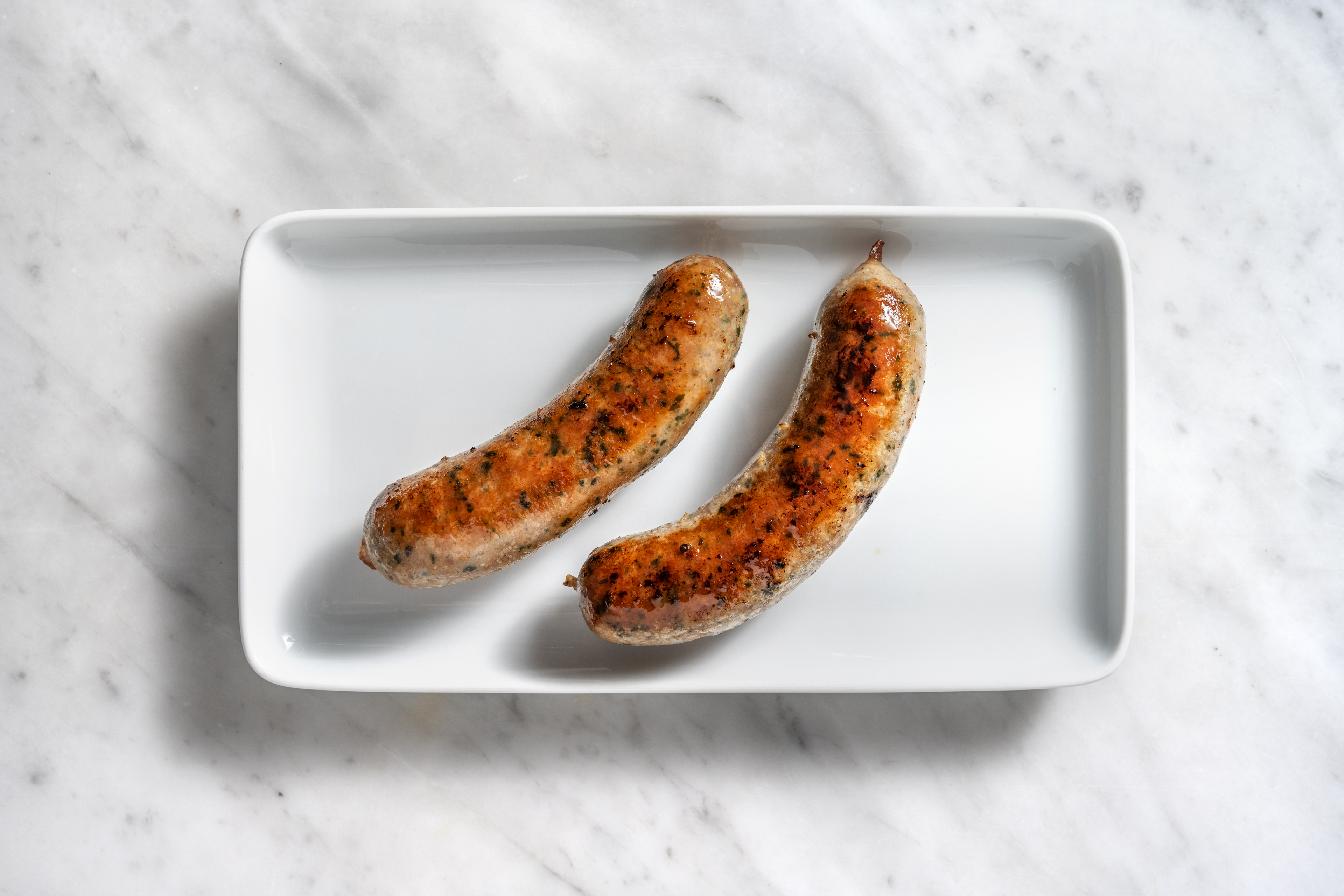 Saucisse de porc à l'oignon et cheddar en extra