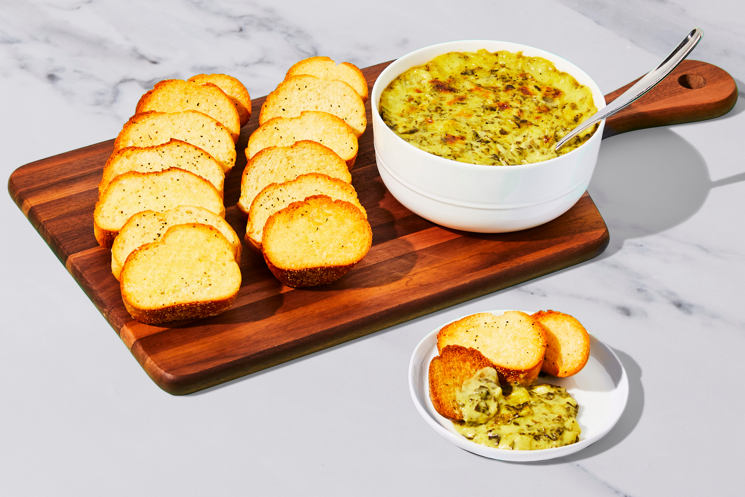 Spinach Artichoke Dip with Toasted Baguettes