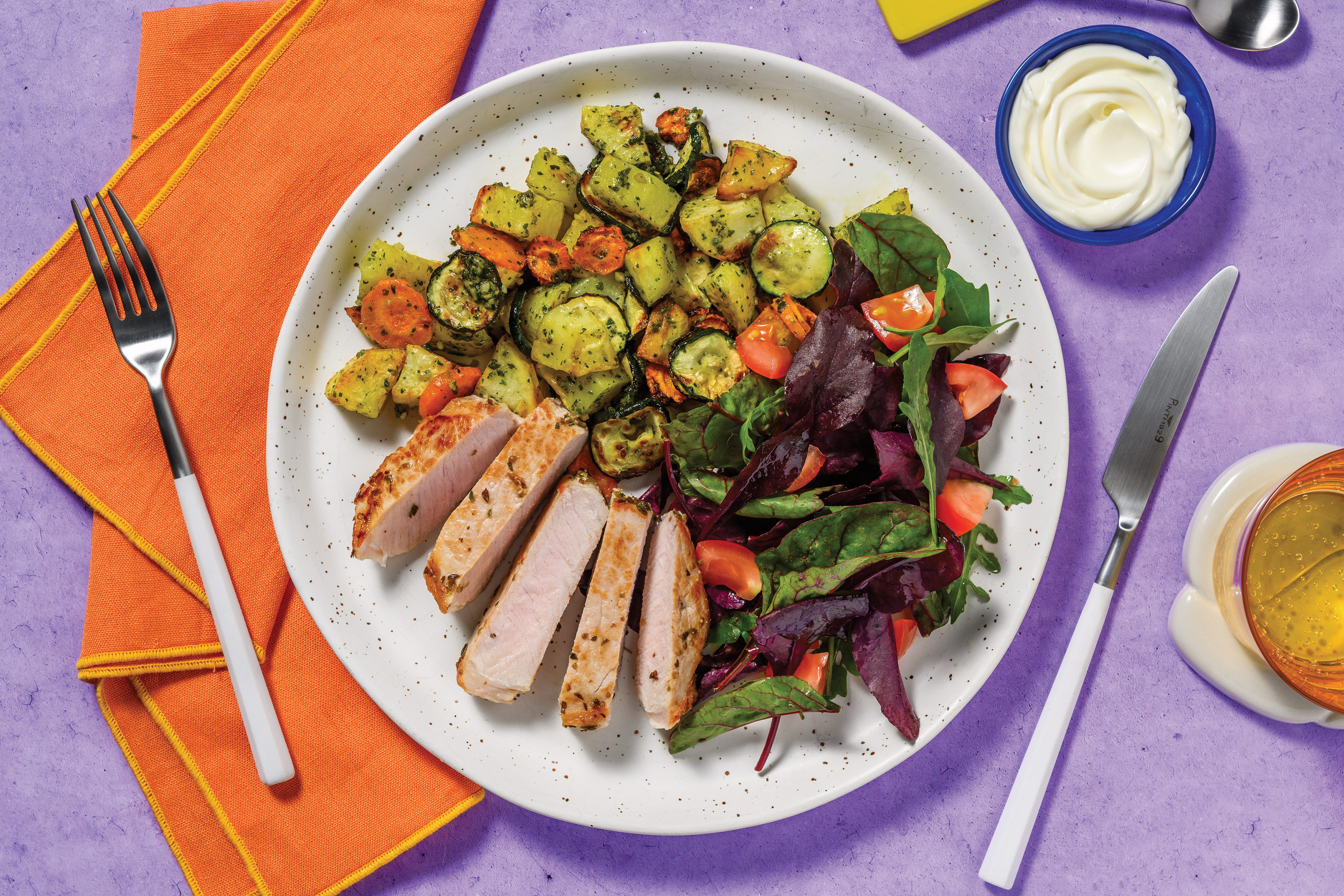 Easy Garlic-Herb Pork Steak & Pesto Veggies