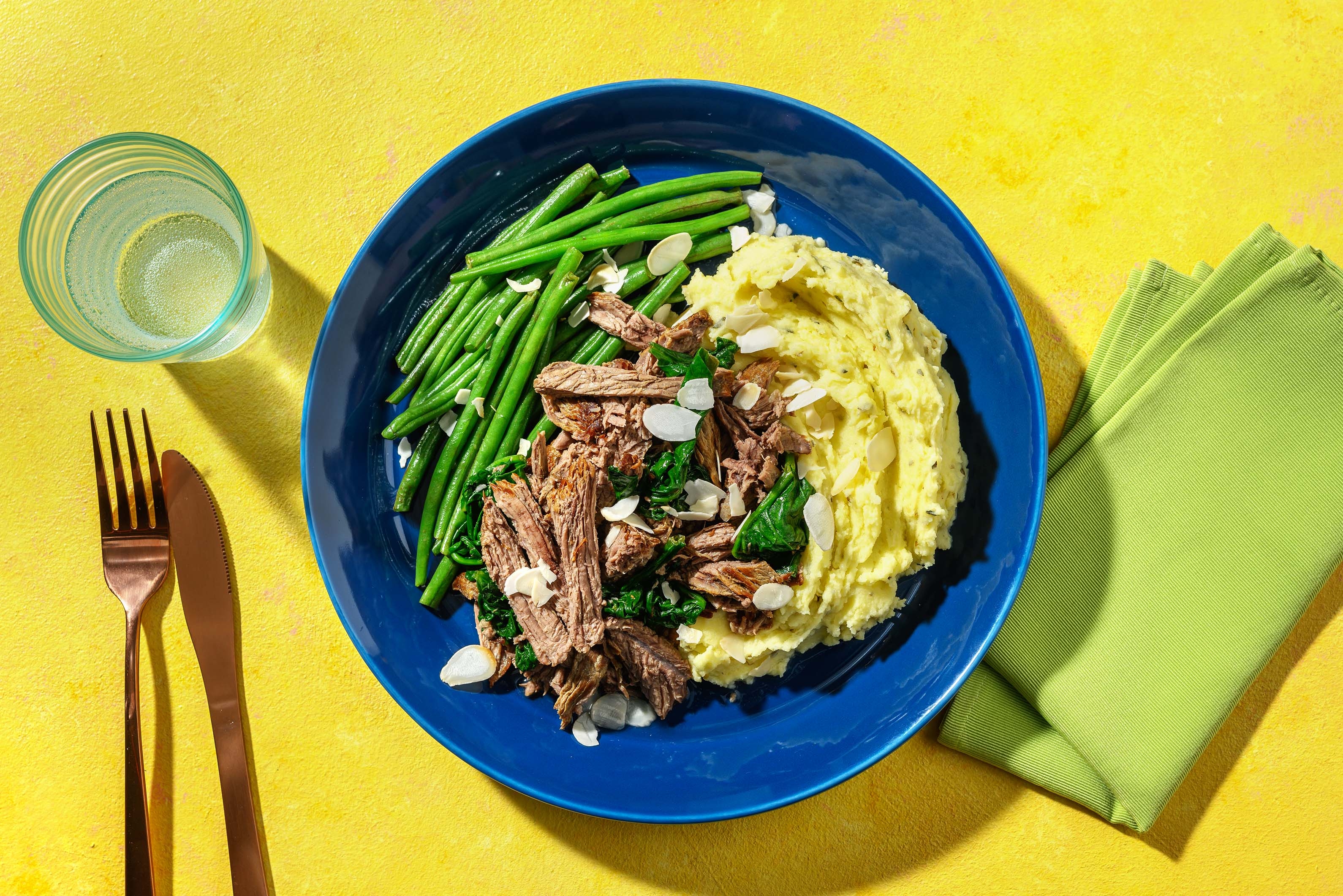 Beef Brisket Ragu & Creamy Herb Mash with Steamed Green Beans & Flaked Almonds