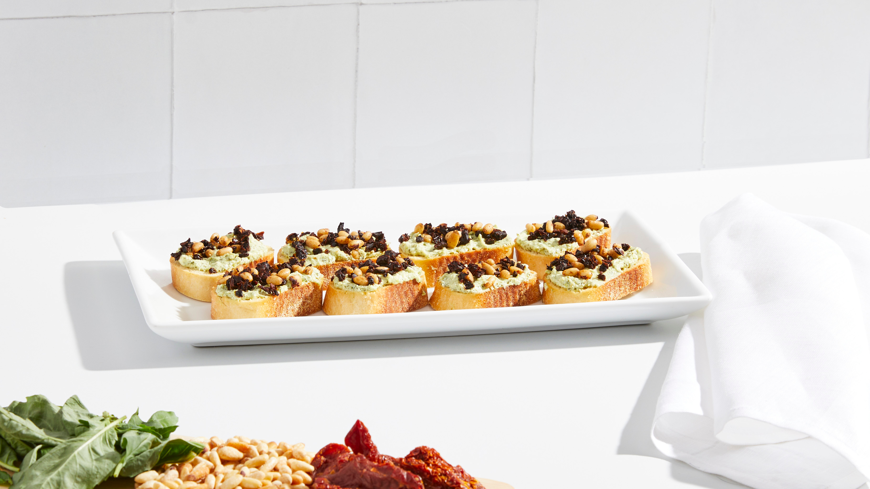 Sun-Dried Tomato & Pesto Ricotta Crostini