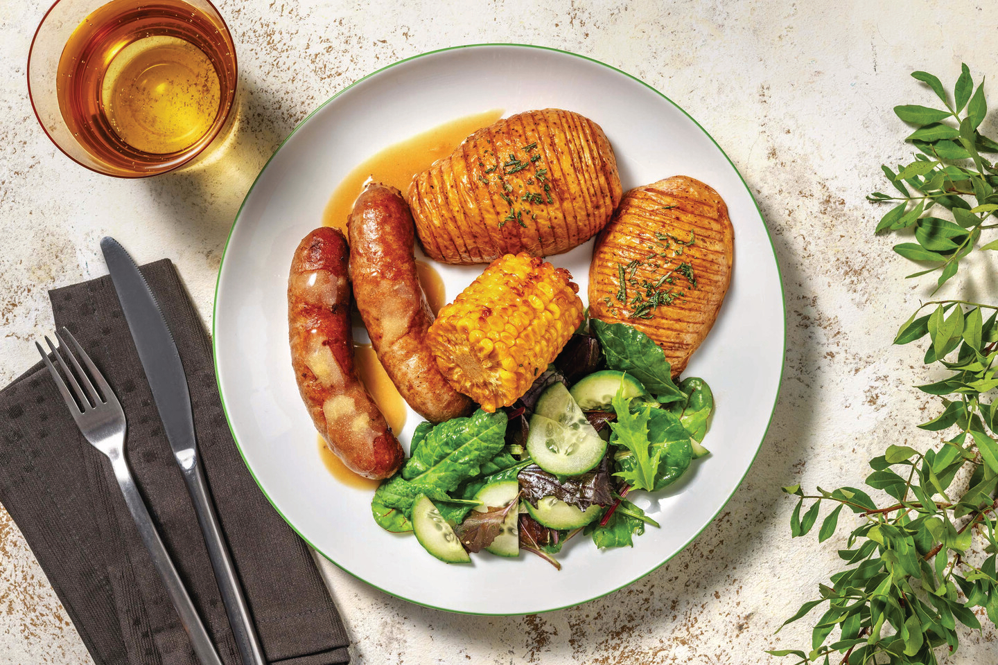 Pork Sausages & Herb Hasselback Potatoes