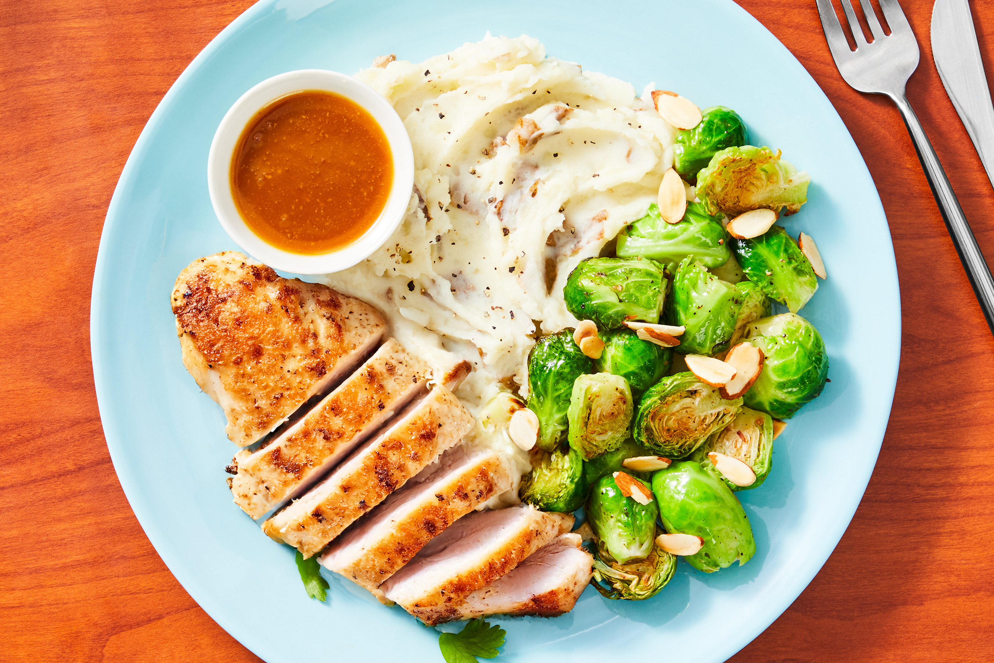 [SIDE VEG SWAP BRUSSELS SPROUTS TO BROCCOLI] MA/CA Only Compliant Pork Filet with Brown Sugar Orange Gravy with Brussels & Mashed Potatoes