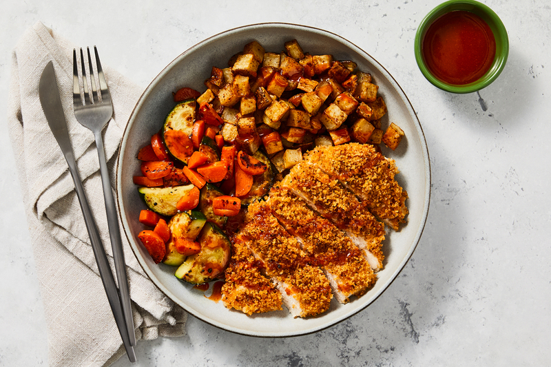 Poitrines de poulet en croûte panko et miel piquant