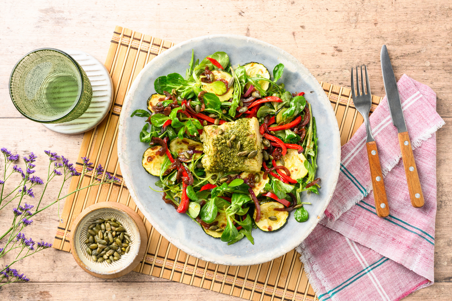 Pesto-Baked Hake with Roasted Courgette and Bell Pepper