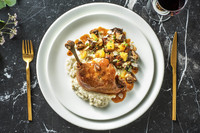 Gekonfijte eendenpoot met sinaasappelsaus en aardpeerpuree