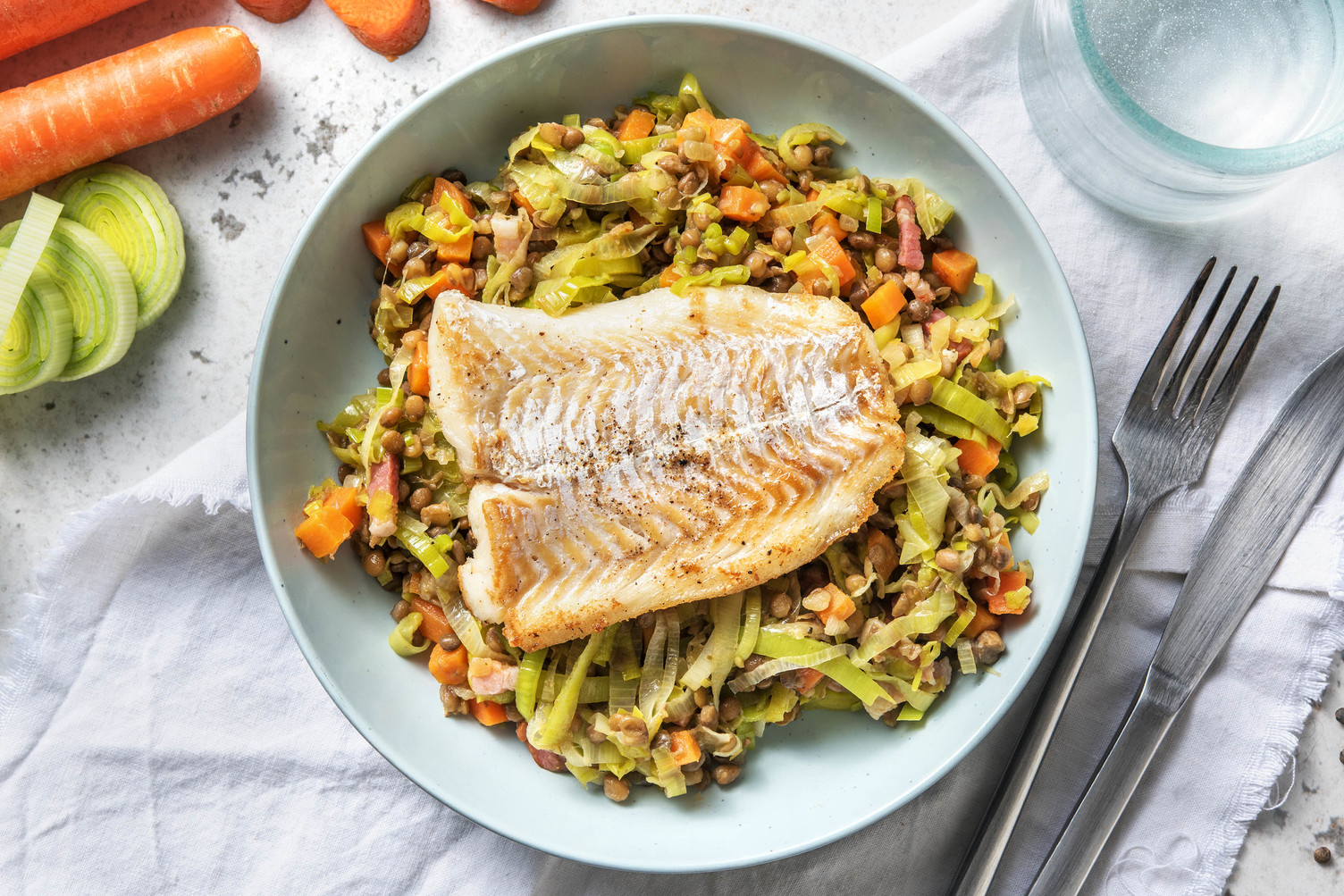 Schelvisfilet met linzen en spekjes