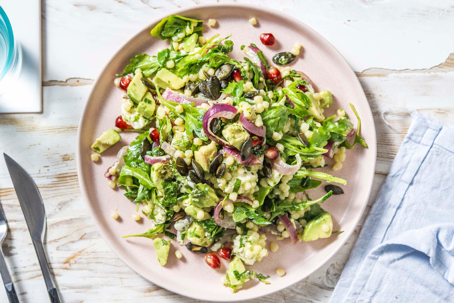 Salade couscous perlé, feta rôtie & grenade