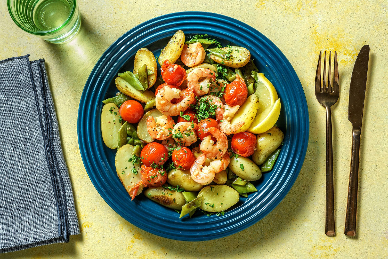 Crevettes à l'ail et tomates cerises poêlées