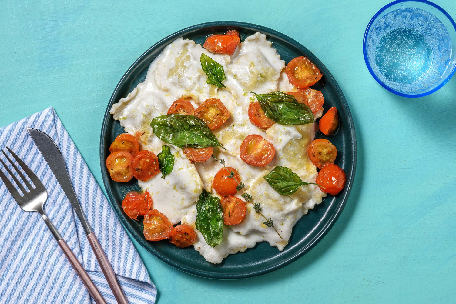 Ravioli al branzino al sugo di ricotta e pomodorini