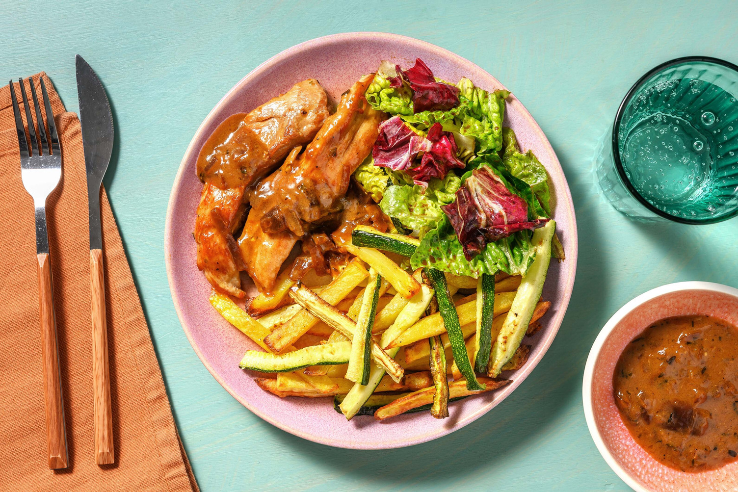 Saucisse de Toulouse à la sauce thym & oignon