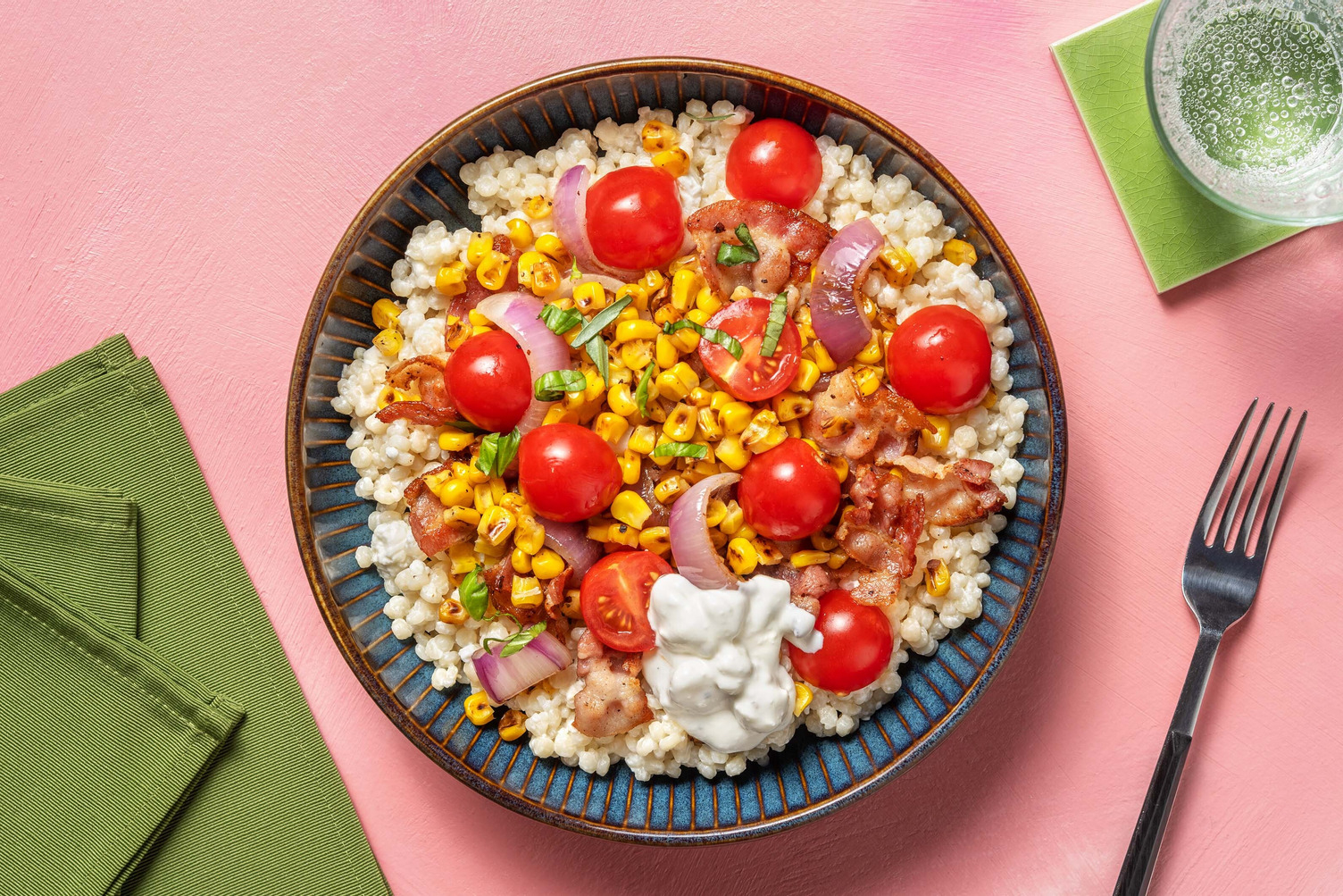 Pearl couscous with crispy bacon and charred corn