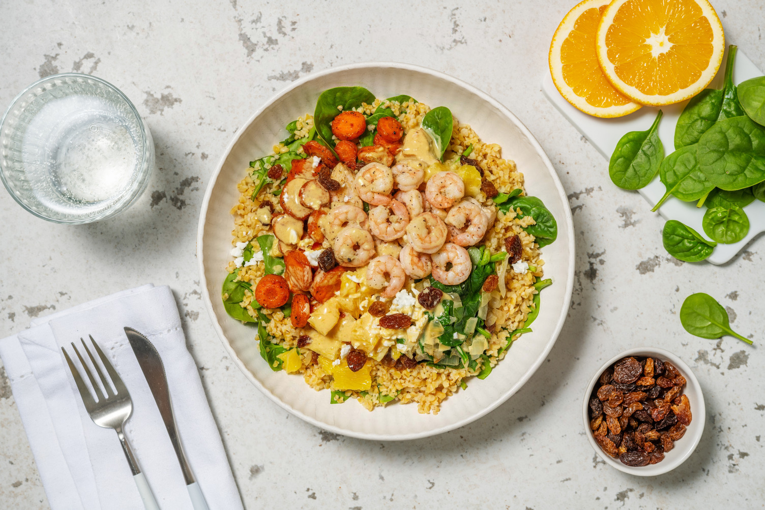 Bulgurbowl met garnalen en sinaasappelvinaigrette