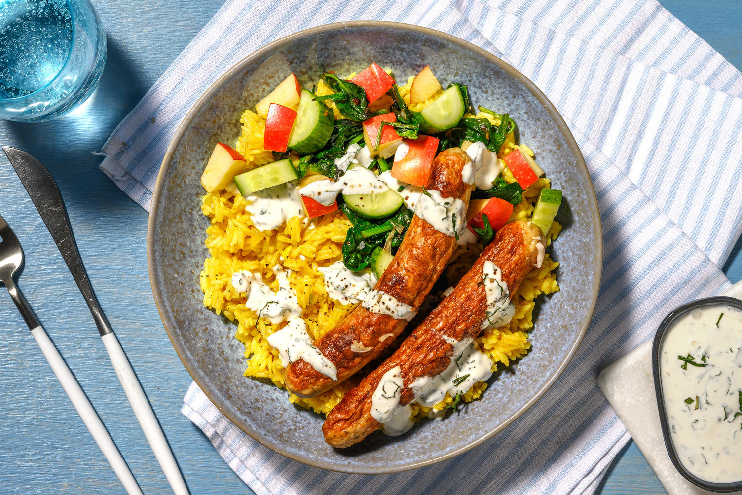 Bowl met rundermerguez en vadouvan-knoflookrijst