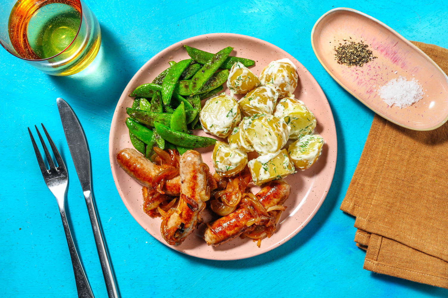 Salchichas encebolladas