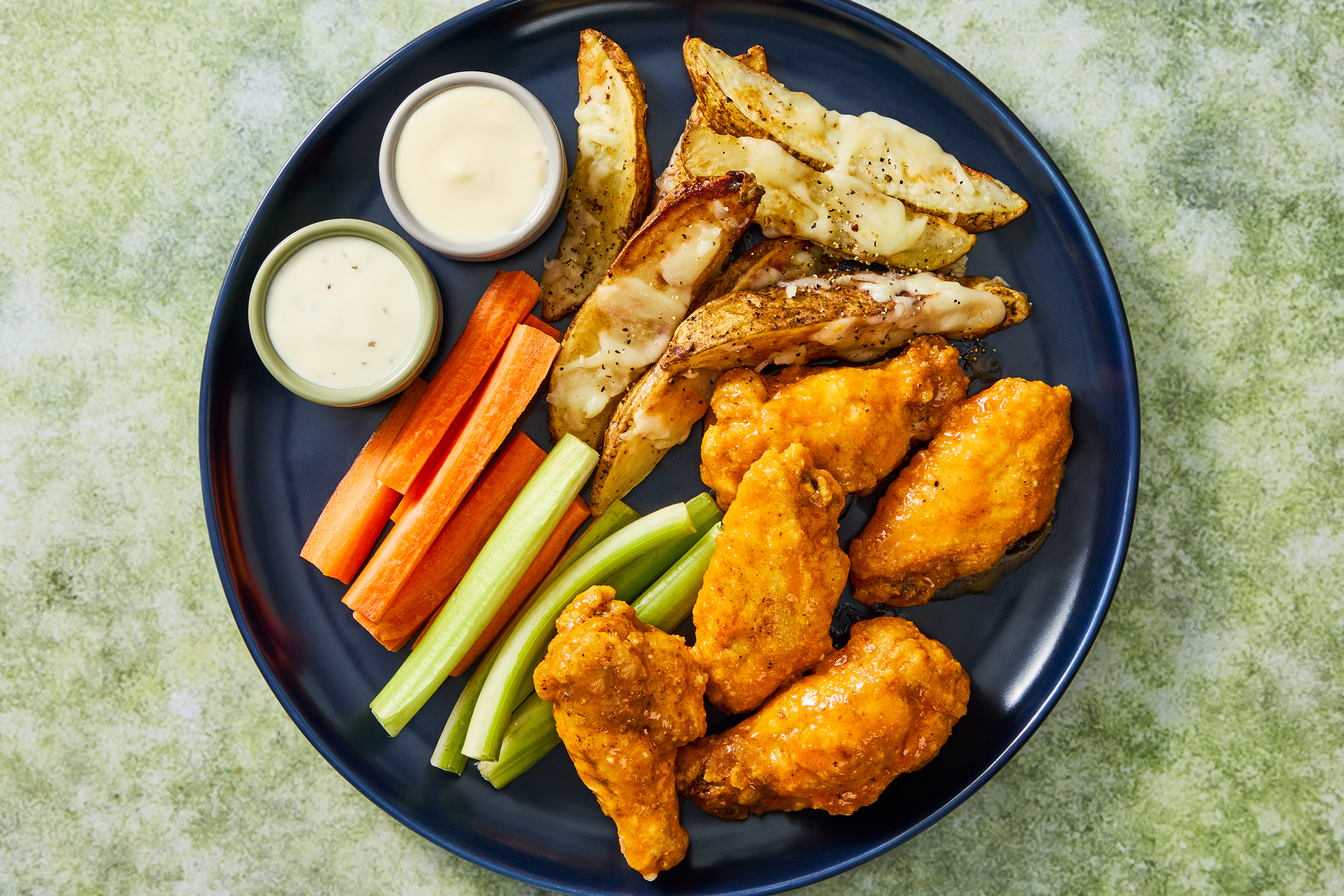 Buffalo Chicken Wings & Cheesy Potato Wedges
