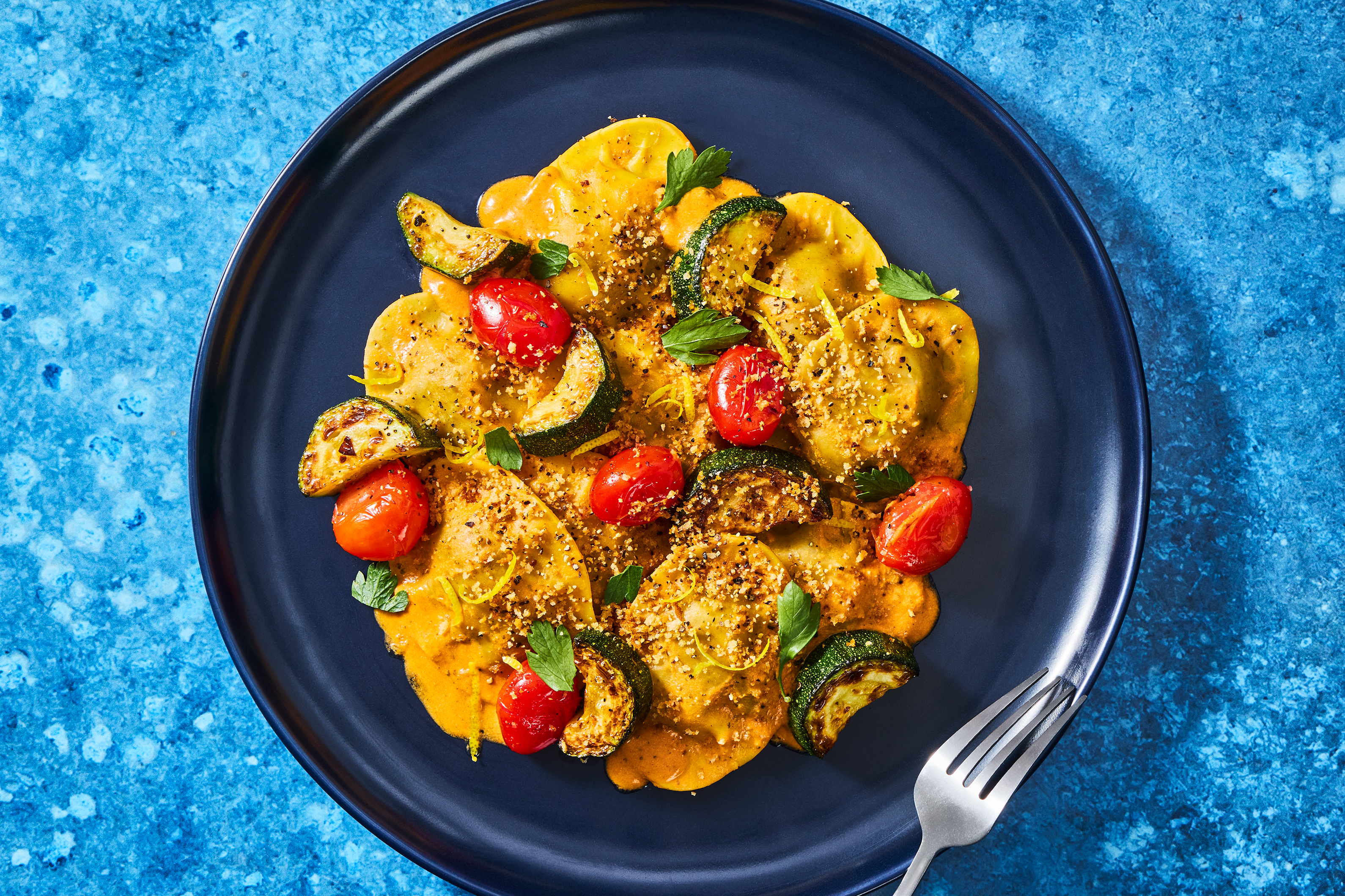 Silky Spinach Ravioli with Pork Sausage