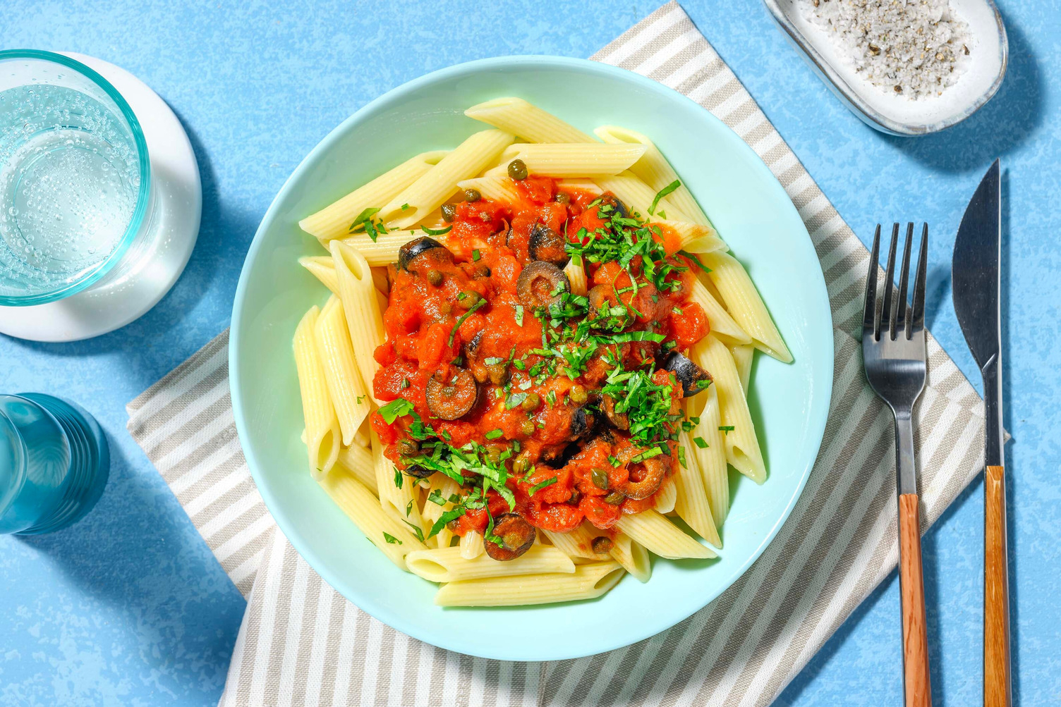 Penne puttanesca met olijven en ansjovis