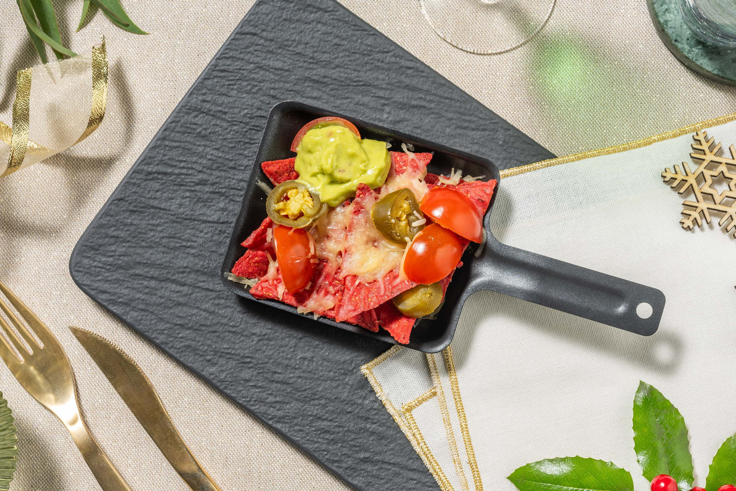 Nacho's met kaas en avocadodip