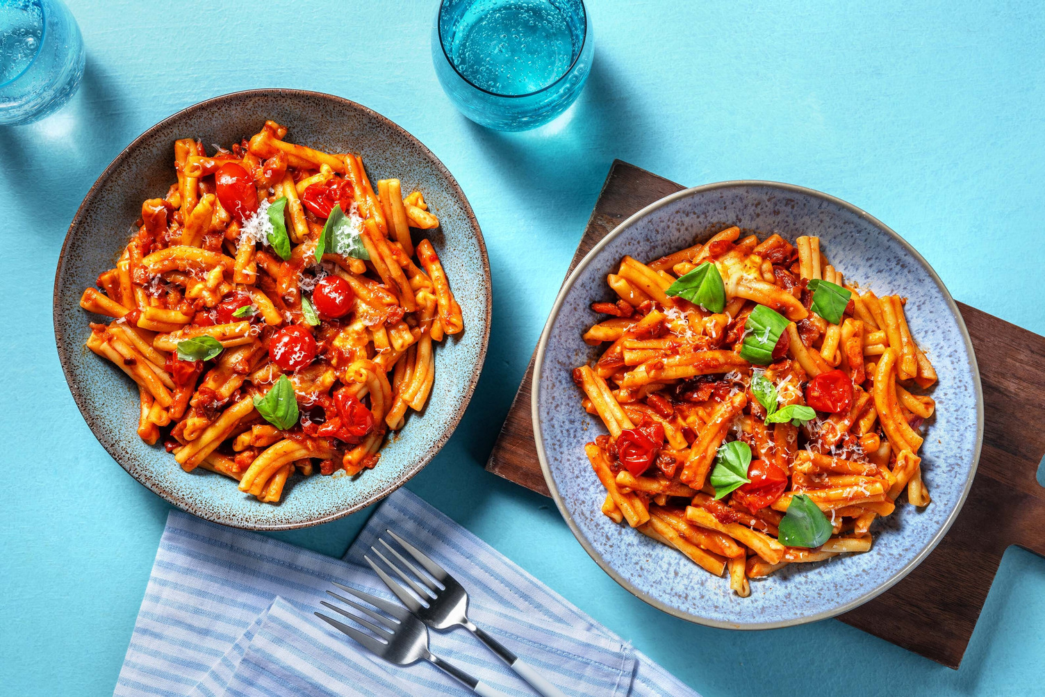Strozzapreti al sugo di ciliegini e pancetta